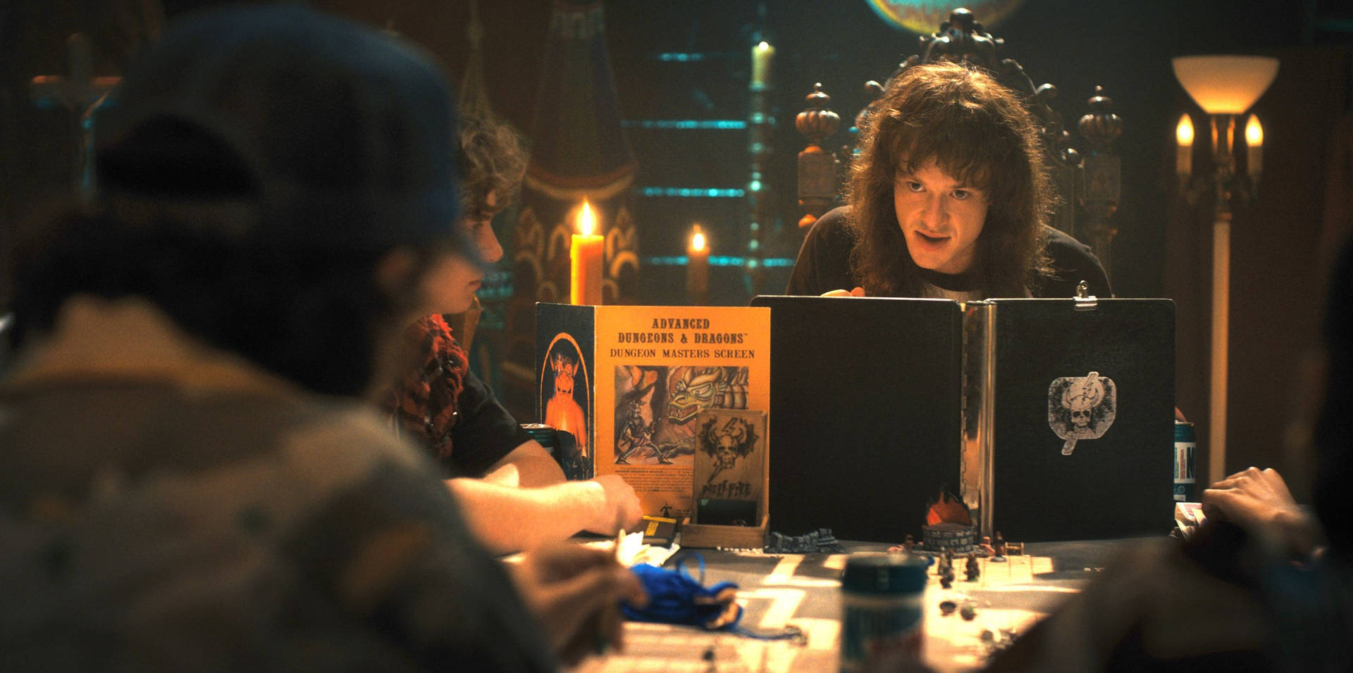 Eddie Munson Playing Dungeons And Dragons With Friends Wallpaper