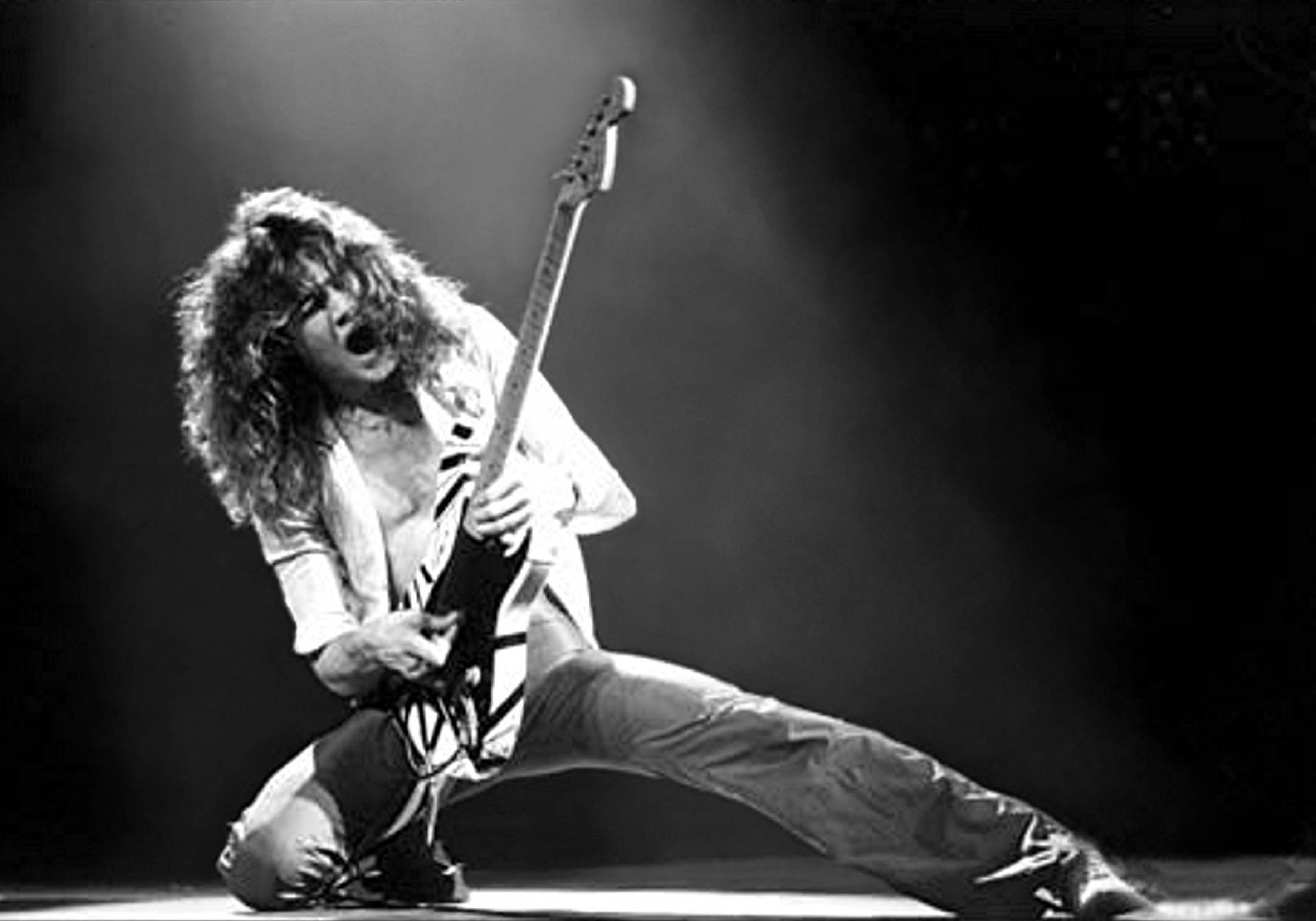 Eddie Van Halen Kneeling Onstage Background