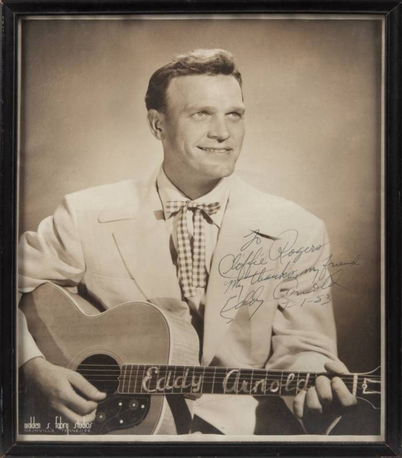 Eddy Arnold Playing Guitar With Signature Wallpaper