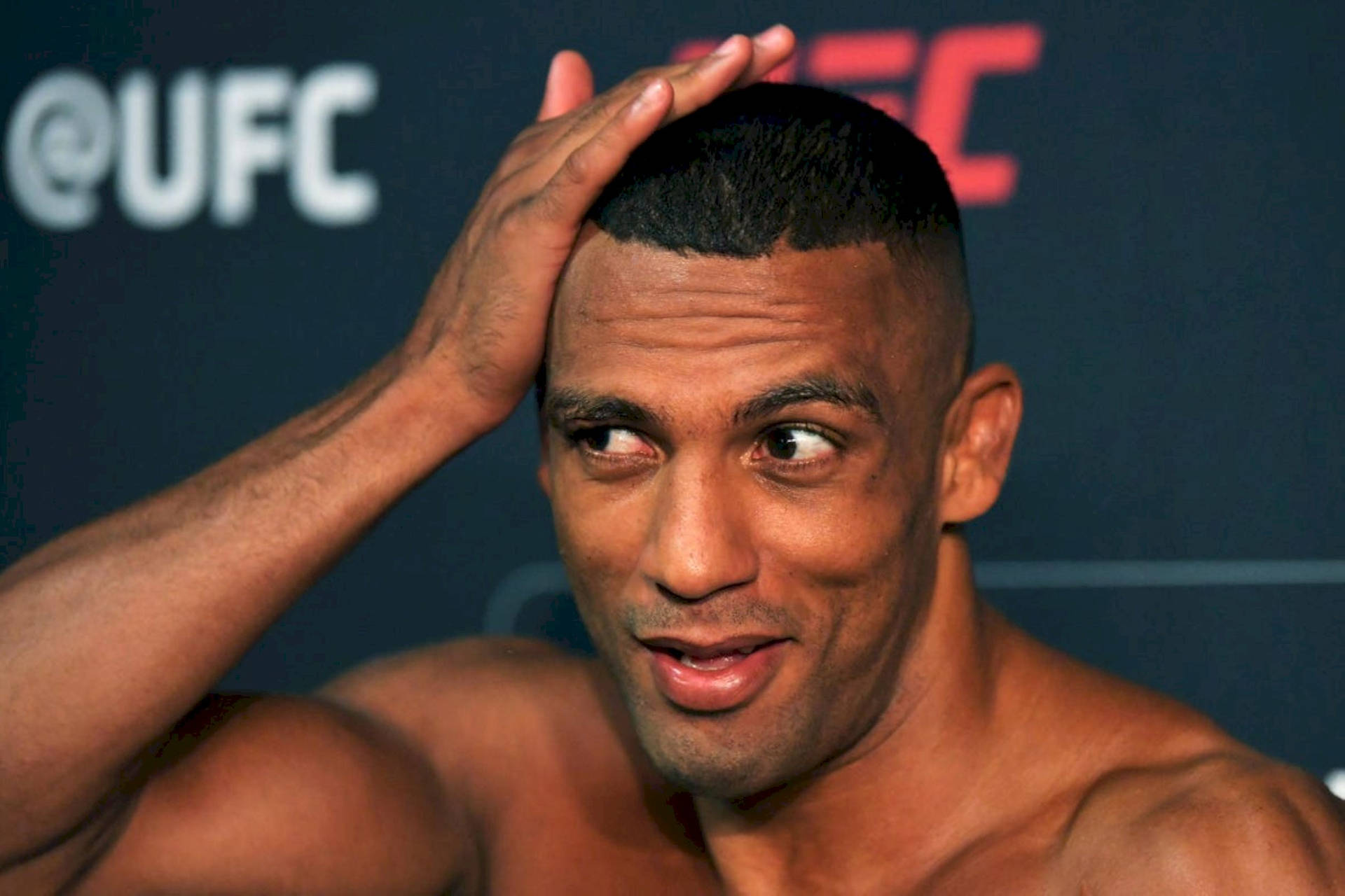 Brazilian MMA Fighter Edson Barboza Holding His Hair Wallpaper