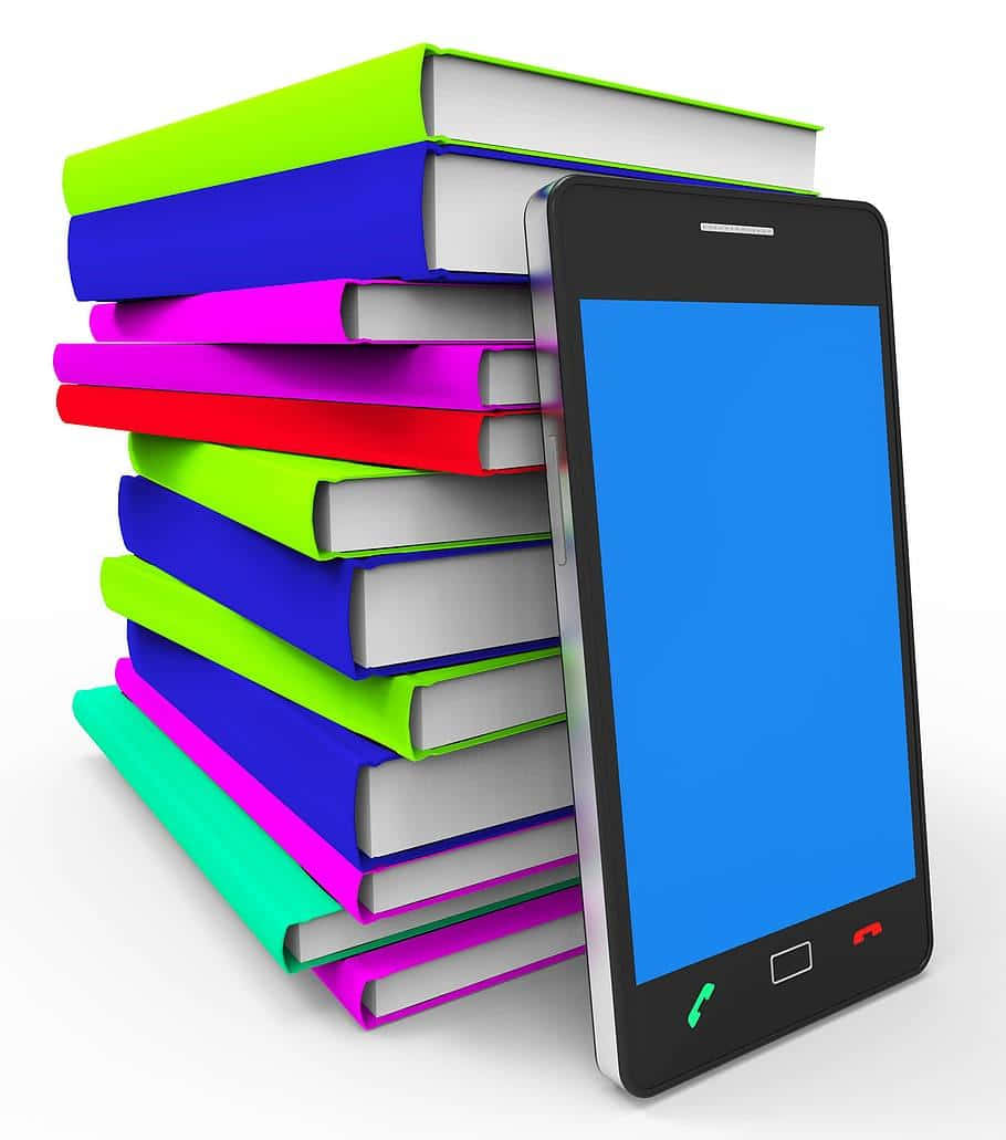 A Smartphone Is Stacked On Top Of A Stack Of Books