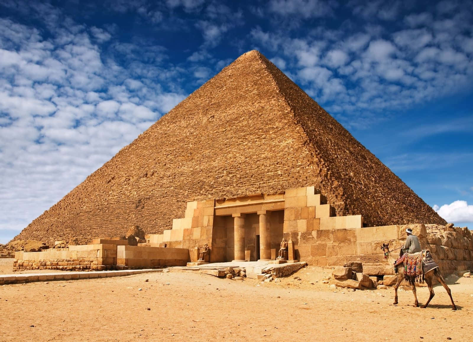 Caption: Majestic Pyramids of Giza under the dazzling skies