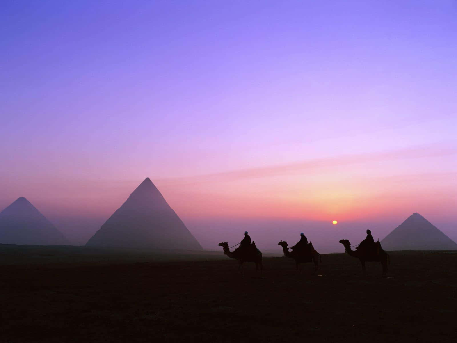 A stunning view of the Giza Pyramids at sunset