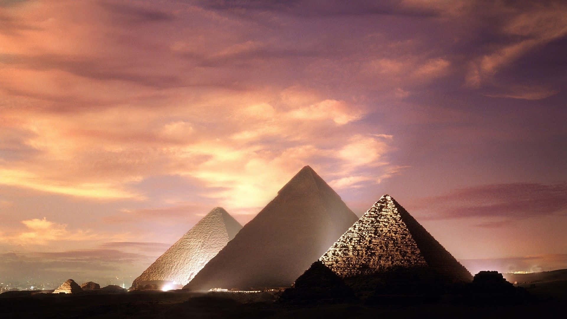 Majestic Pyramids of Giza against a stunning sunset sky