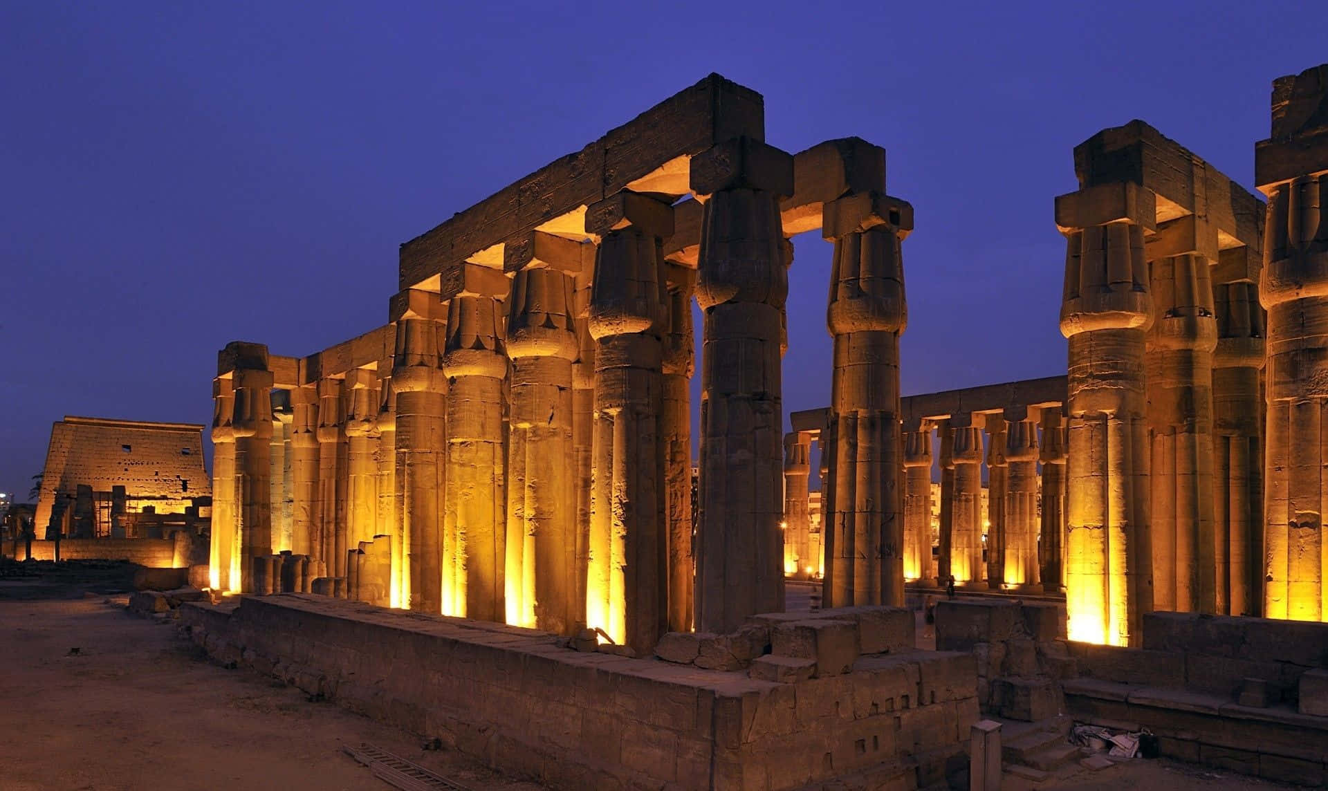 An enchanting view of the Great Pyramids of Giza at sunset