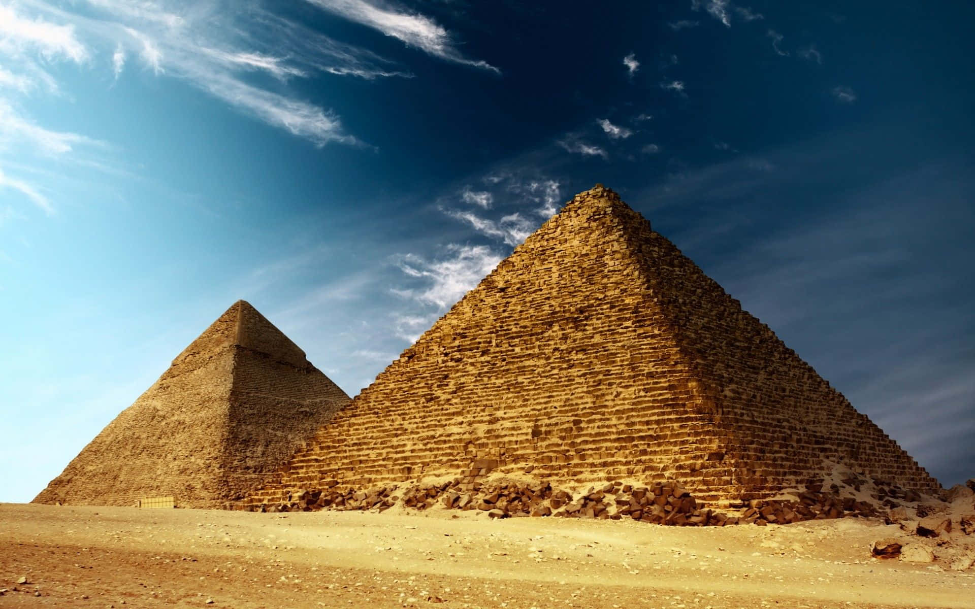 Panoramic view of the breathtaking Giza Pyramids at sunset