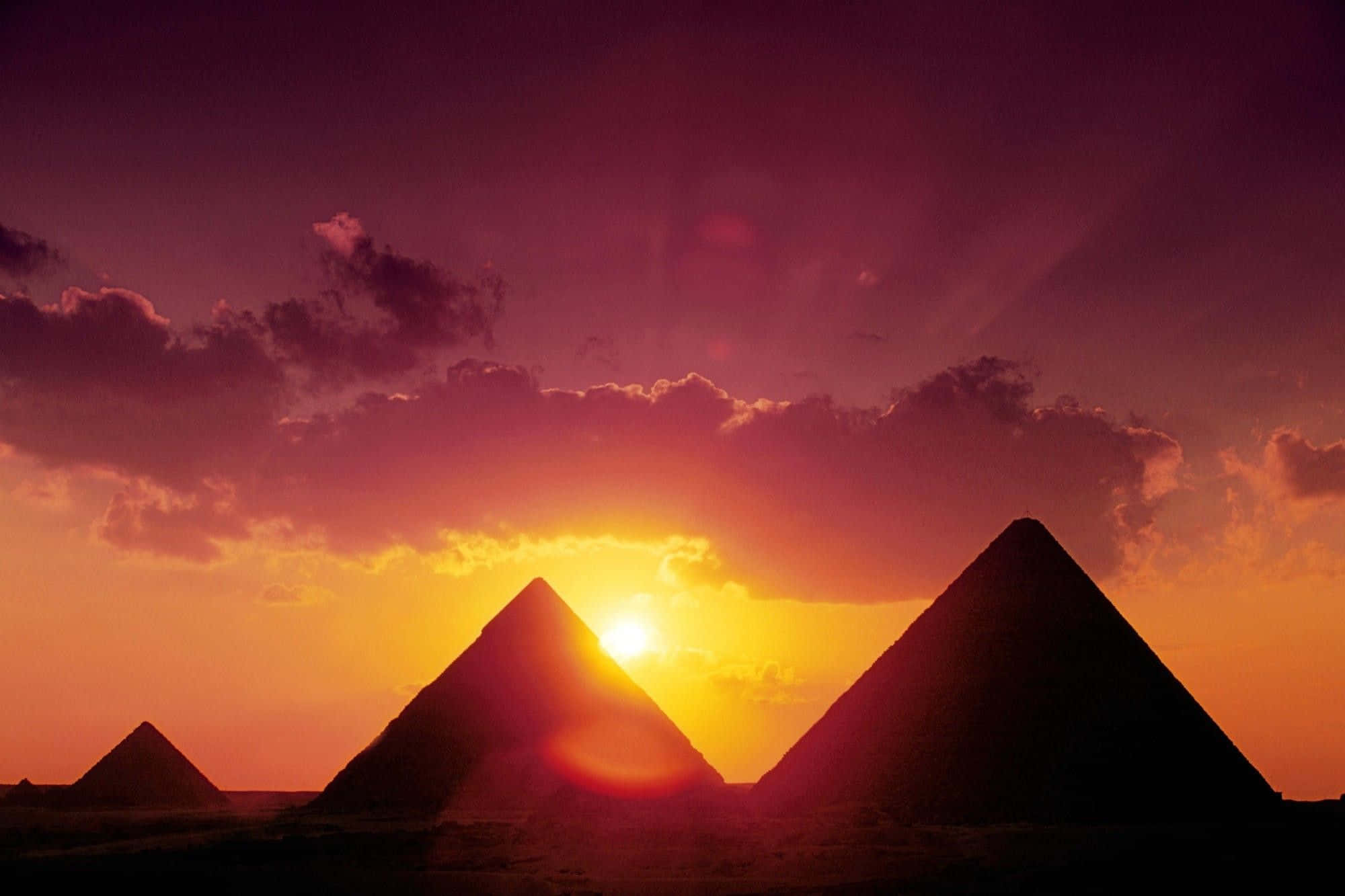 A breathtaking view of the Pyramids of Giza at sunset