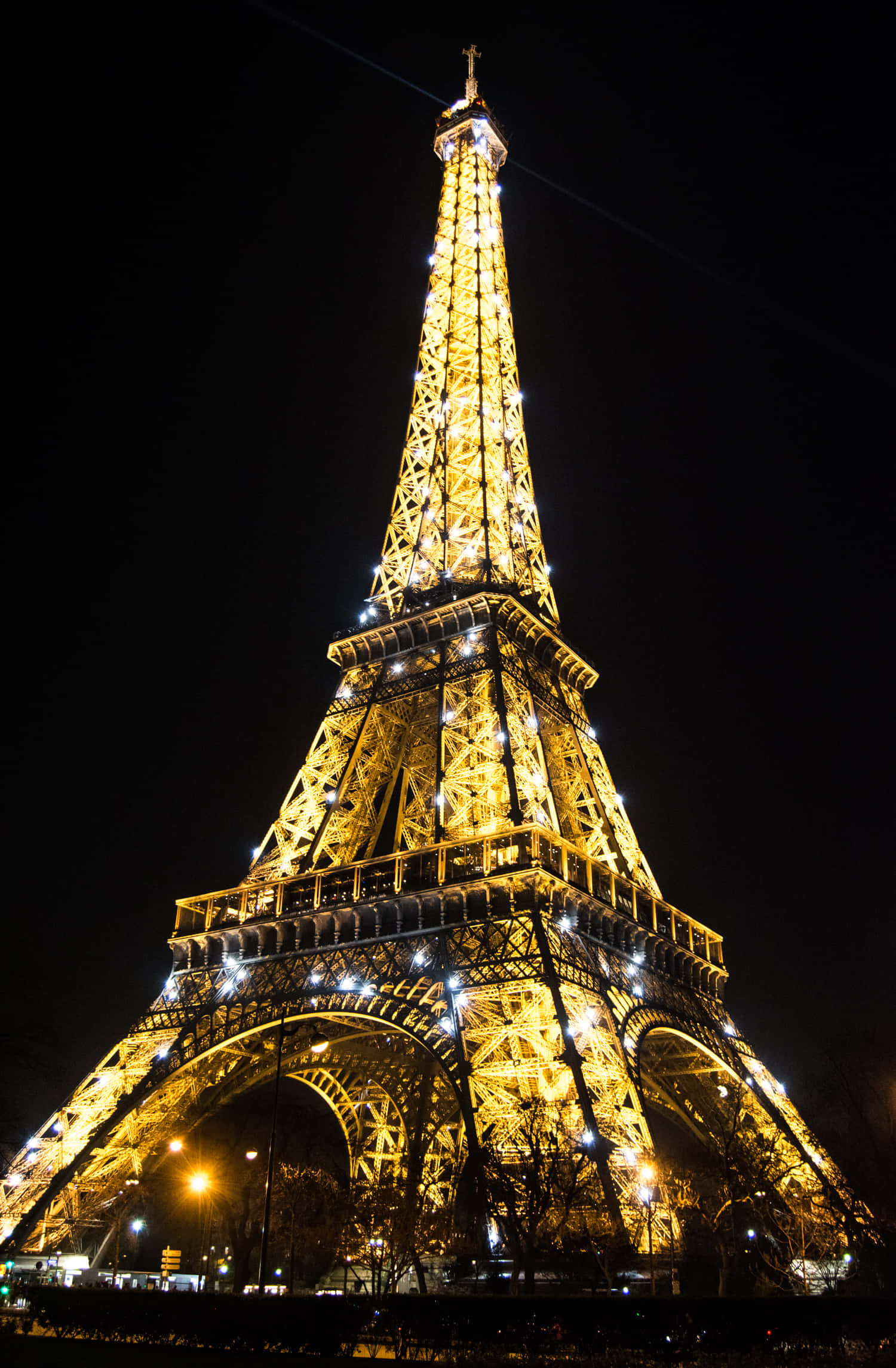 Illuminated Eiffel Tower Against the Night Sky