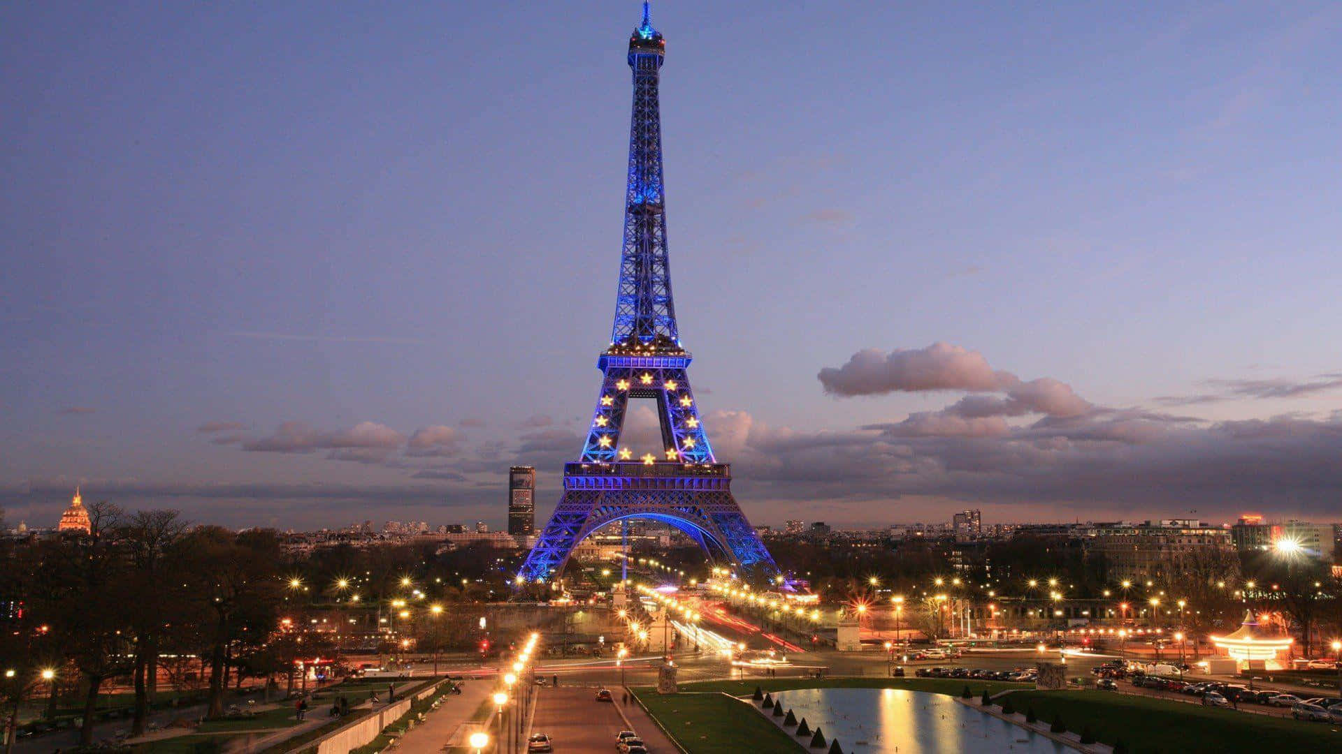 The beautiful Eiffel Tower shines from afar, in the city of lights.