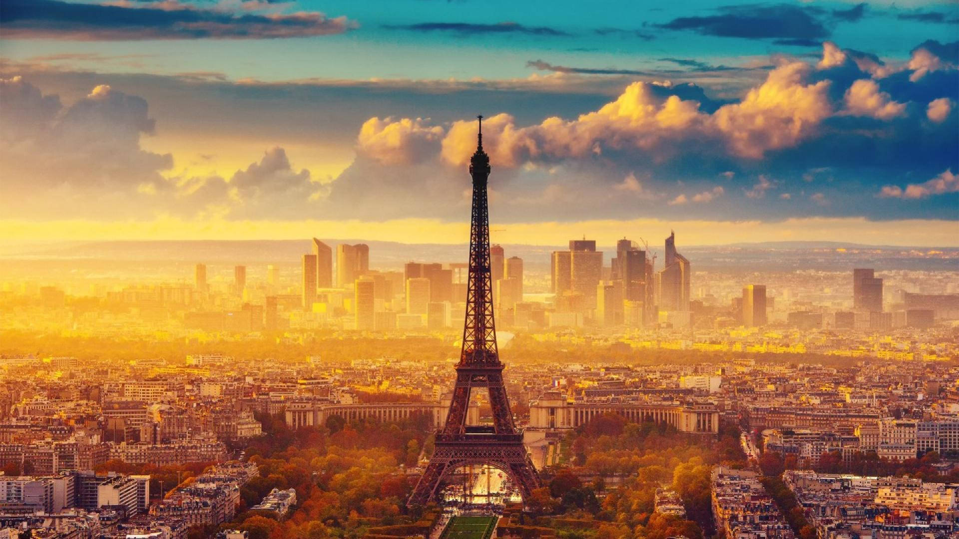 Eiffel-tårnet lyse orange solnedgang: Wallpaper