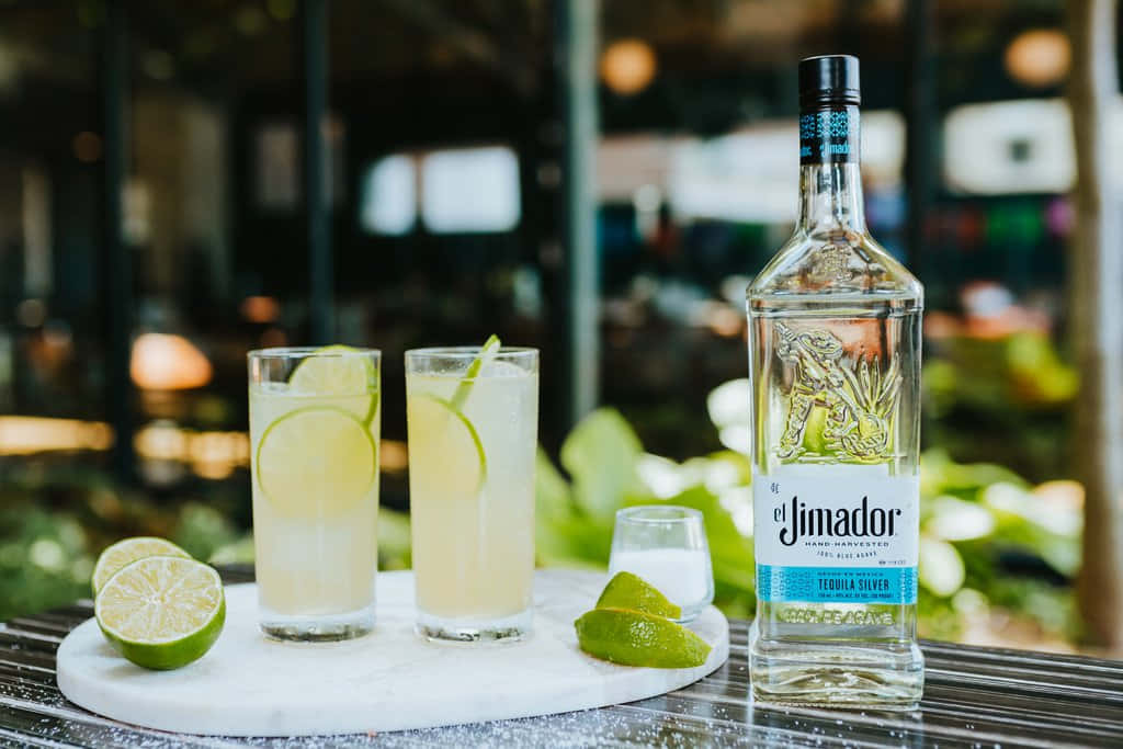 El Jimador Silver Tequila Bottle With Lime Paloma Mix Wallpaper