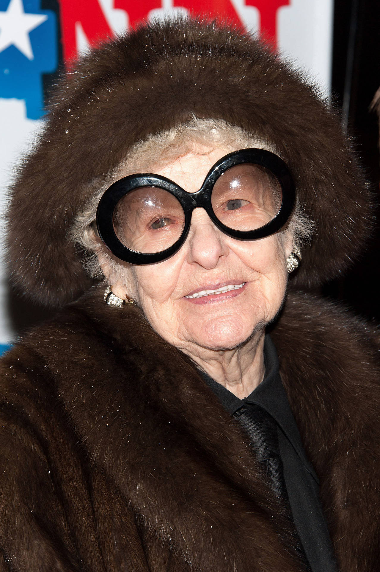 "Elaine Stritch striking a pose in matching coat and cap" Wallpaper