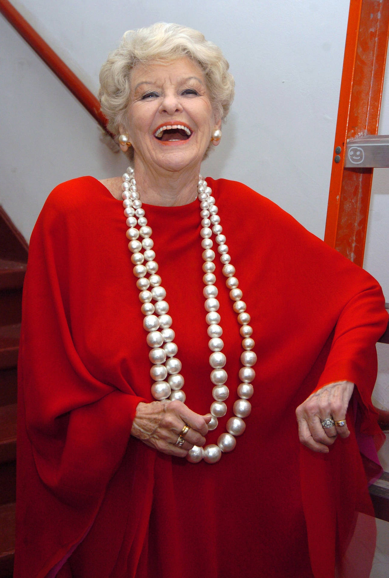 Elaine Stritch Laughing In A Loose Red Top Wallpaper