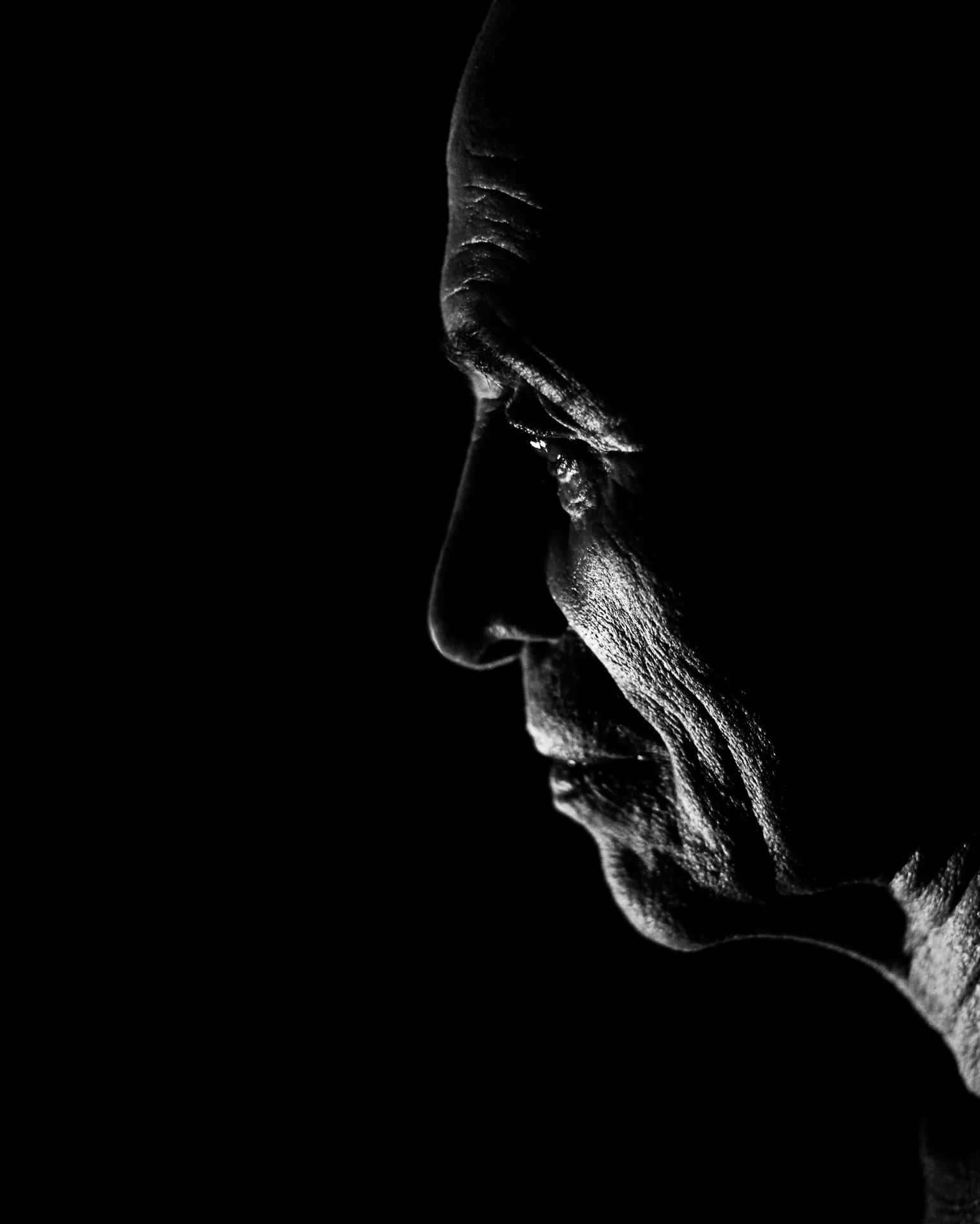 Elderly Man Contemplation Profile Wallpaper