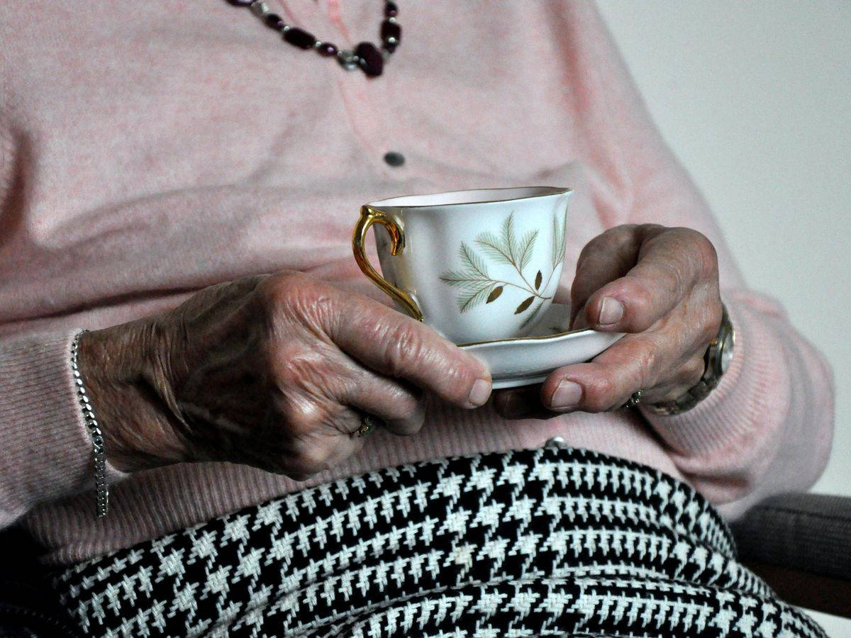 Elderly Woman Tea Wallpaper