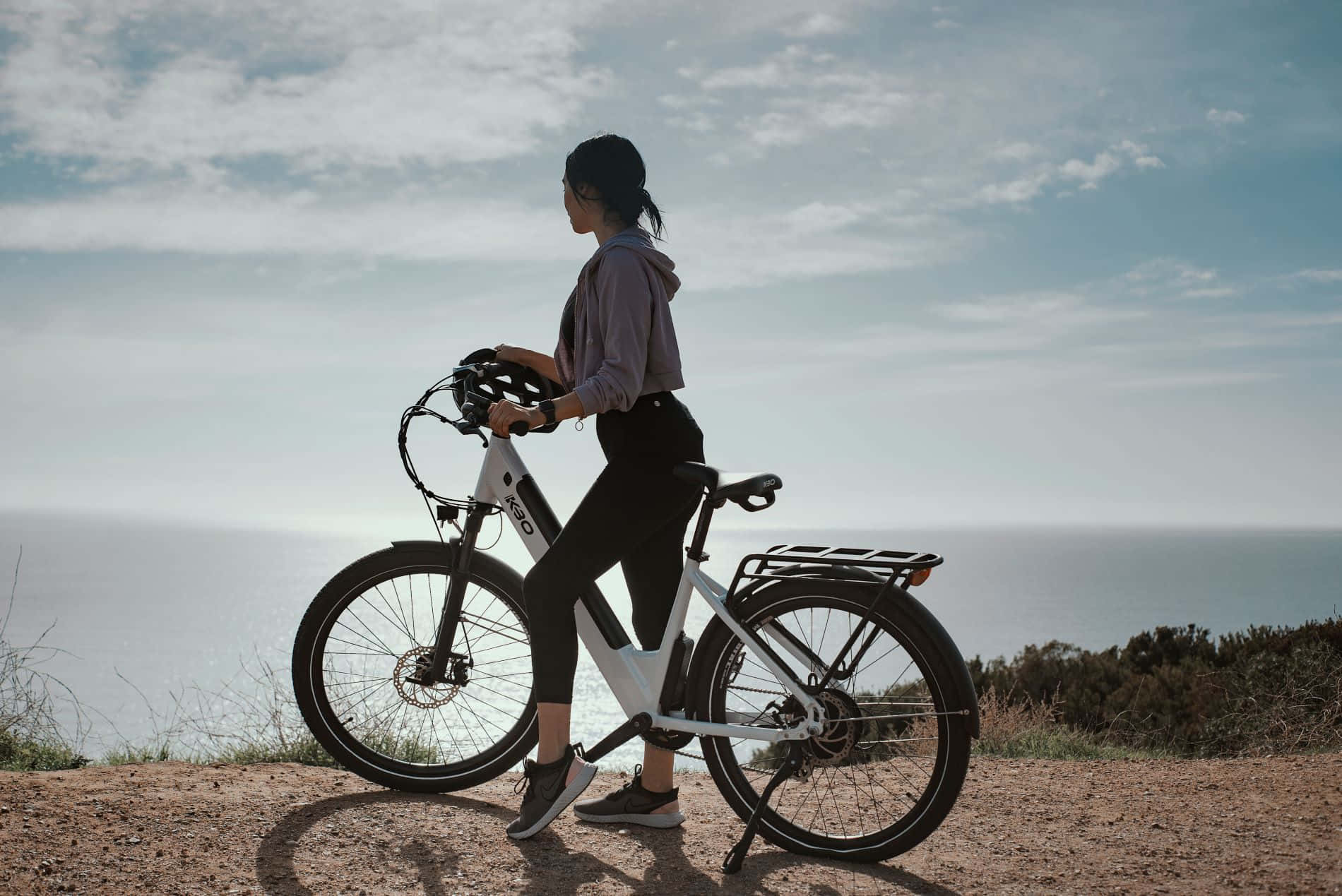 Riding an Electric Bike on a Scenic Route Wallpaper