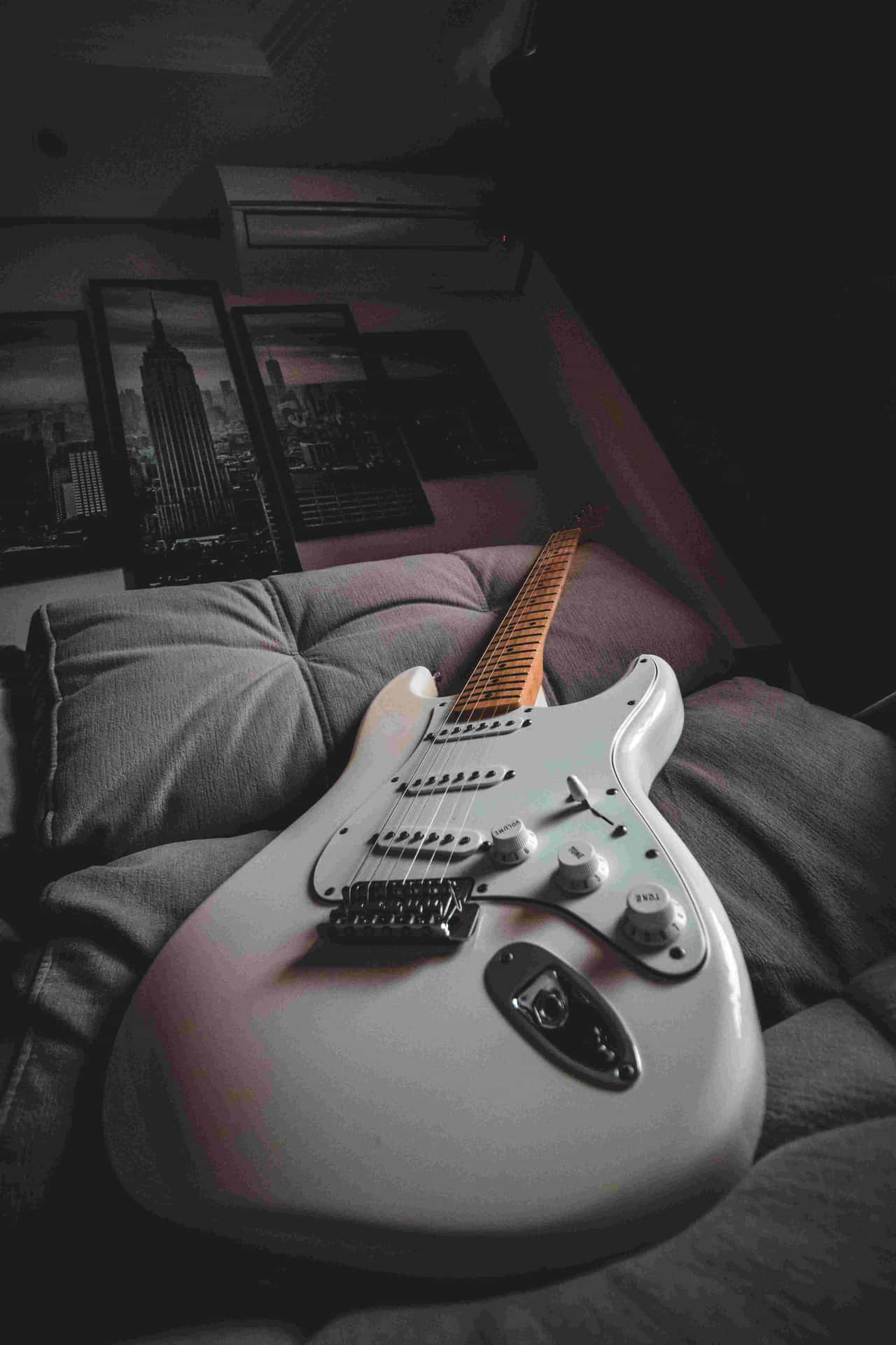 Electric Guitaron Couch Wallpaper