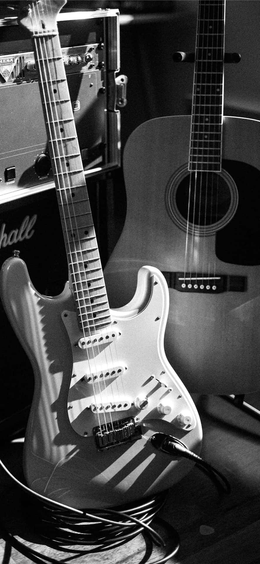 Electricand Acoustic Guitarsin Blackand White Wallpaper
