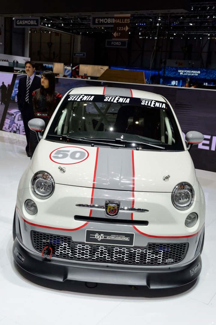 Electrifying Speed: The Abarth 695 Rally Edition In Action Wallpaper