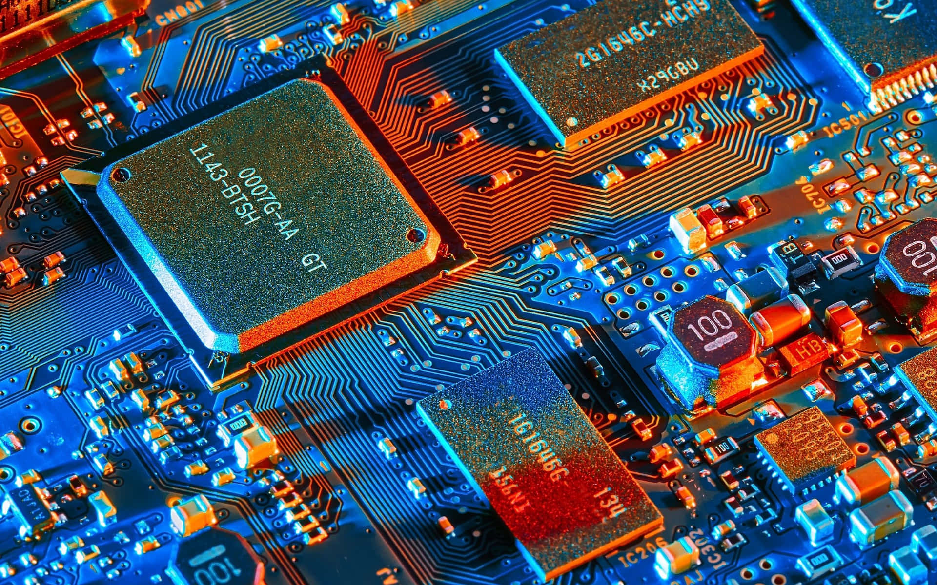 Assorted Electronic Components on a Circuit Board Wallpaper