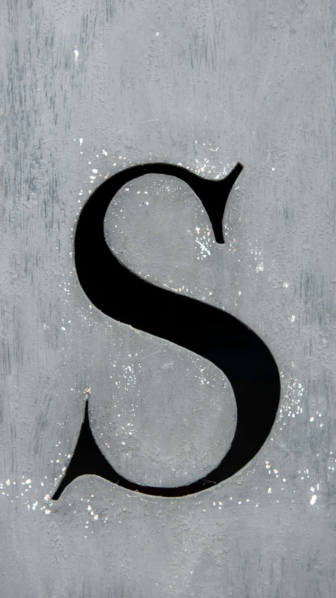 Elegant Black S Letteron Textured Background.jpg Wallpaper