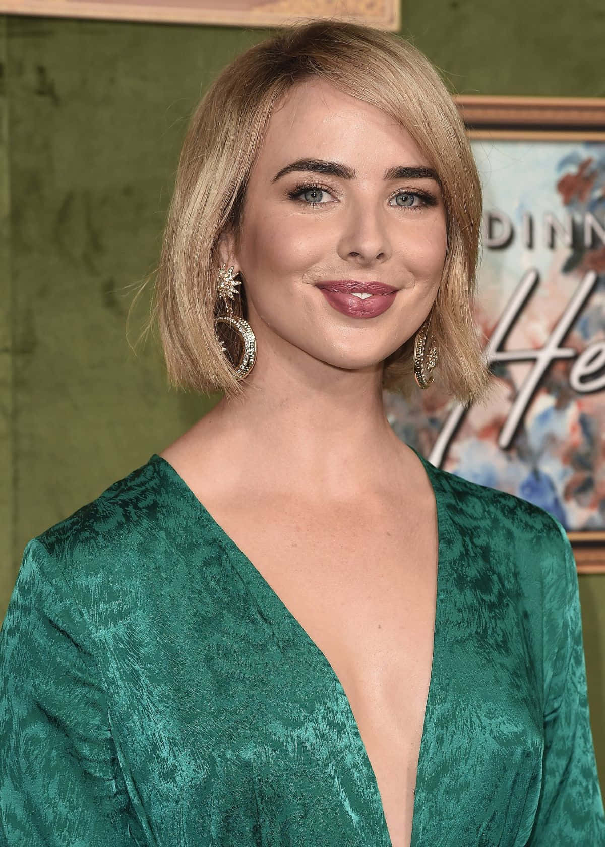 Elegant Blonde Woman Green Dress Wallpaper