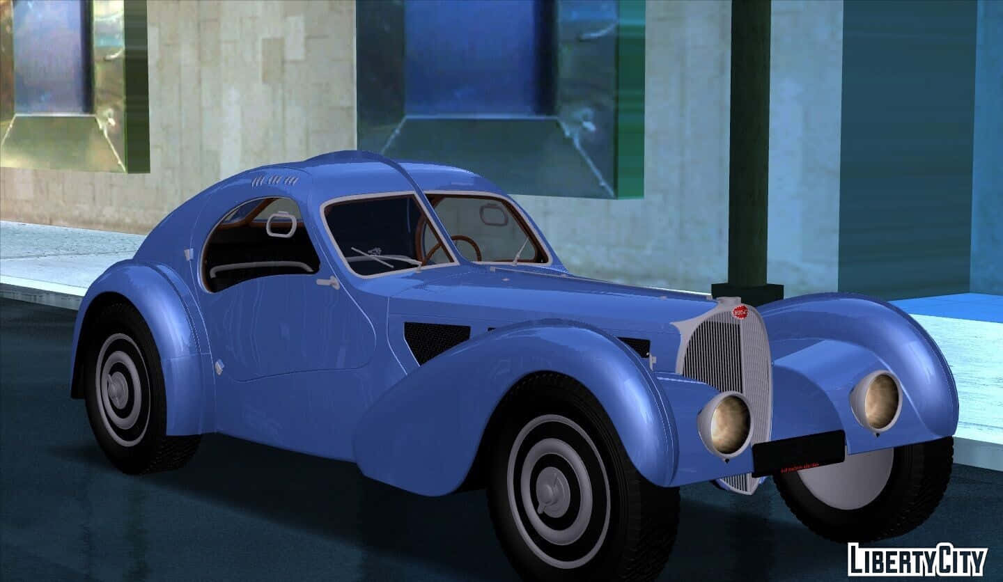 Elegant Bugatti Type 57sc Atlantic Glowing Under The Spotlight Wallpaper