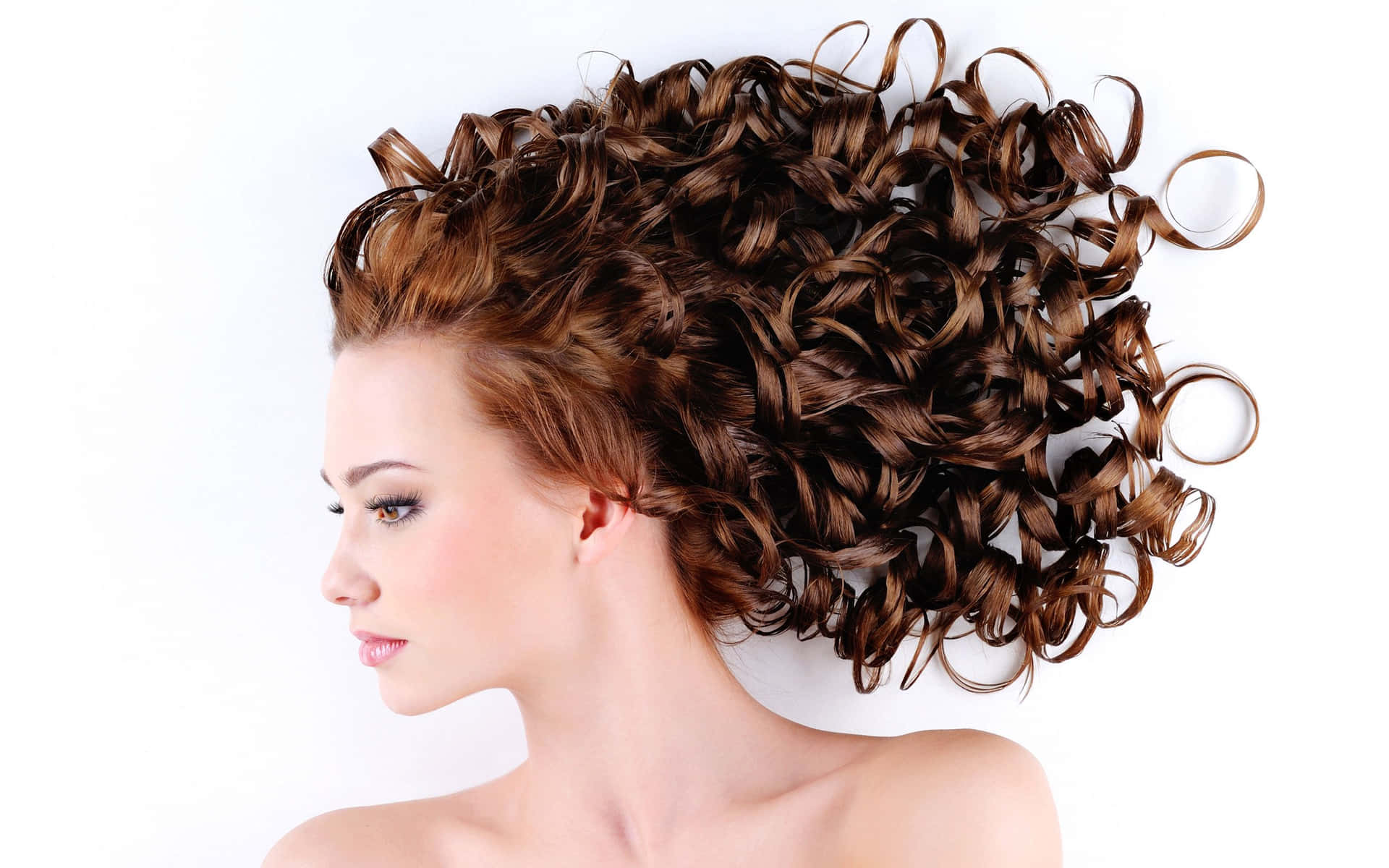 Elegant Curly Updo Hairstyle Wallpaper