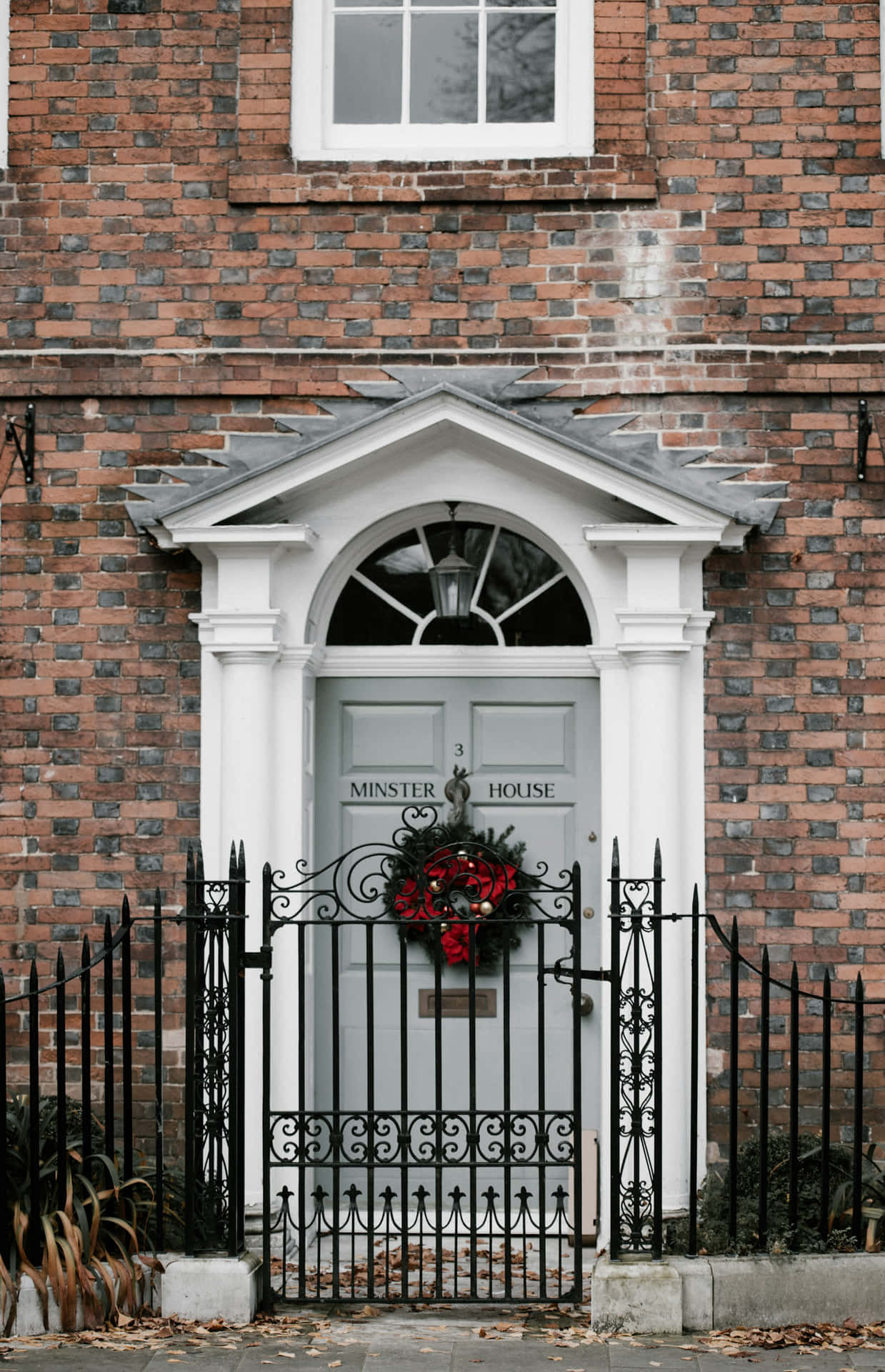 Elegant Doorway With Christmas Wreath Wallpaper