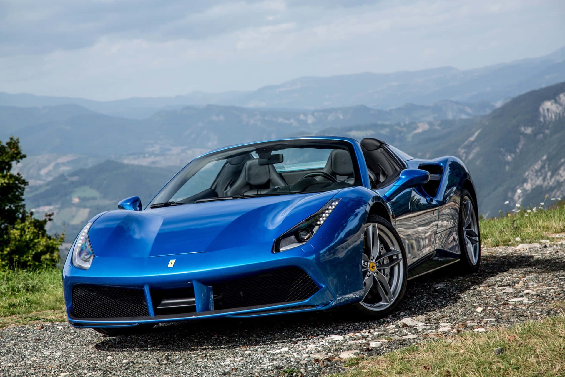 Elegant Ferrari 488 Gtb In Vibrant City Nightscape Wallpaper