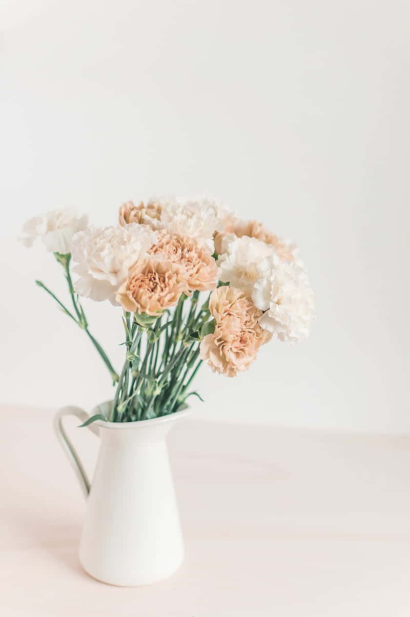 Elegant Floral Arrangementin White Vase Wallpaper