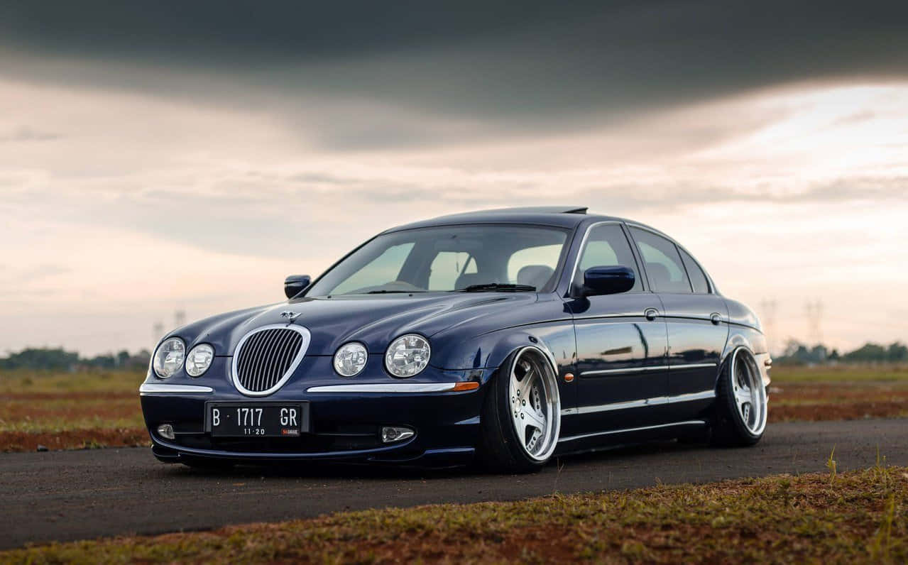 Elegant Jaguar S-type In Dramatic Setting Wallpaper