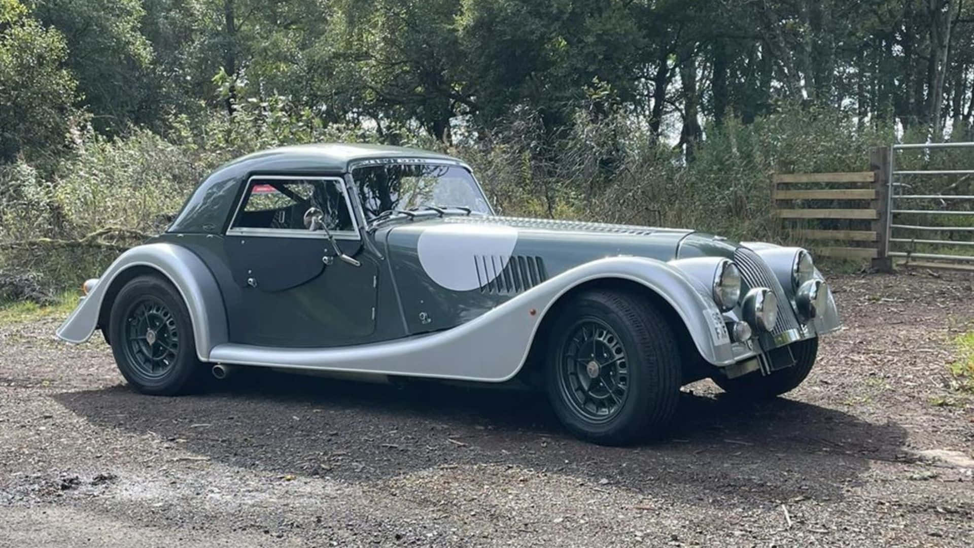 Elegant Morgan Roadster In Sunset Hues Wallpaper