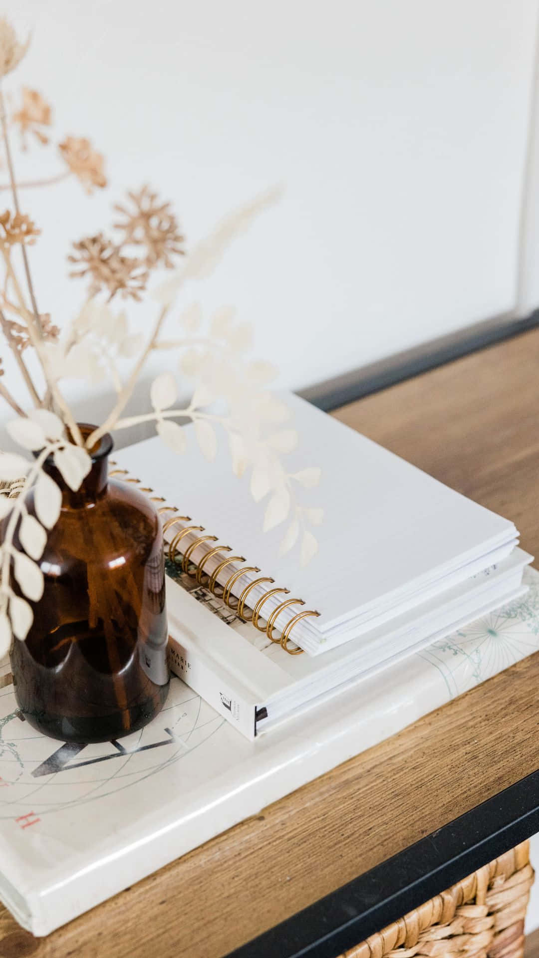 Elegant Notebookand Vase Setup Wallpaper