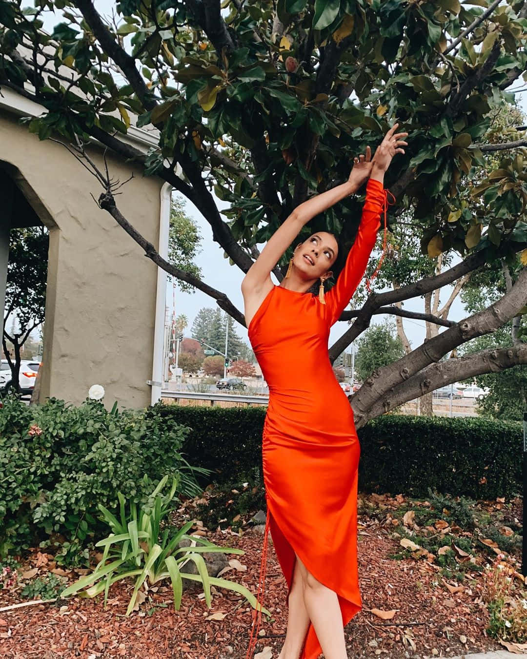 Elegant Orange Dress Outdoor Photoshoot Wallpaper