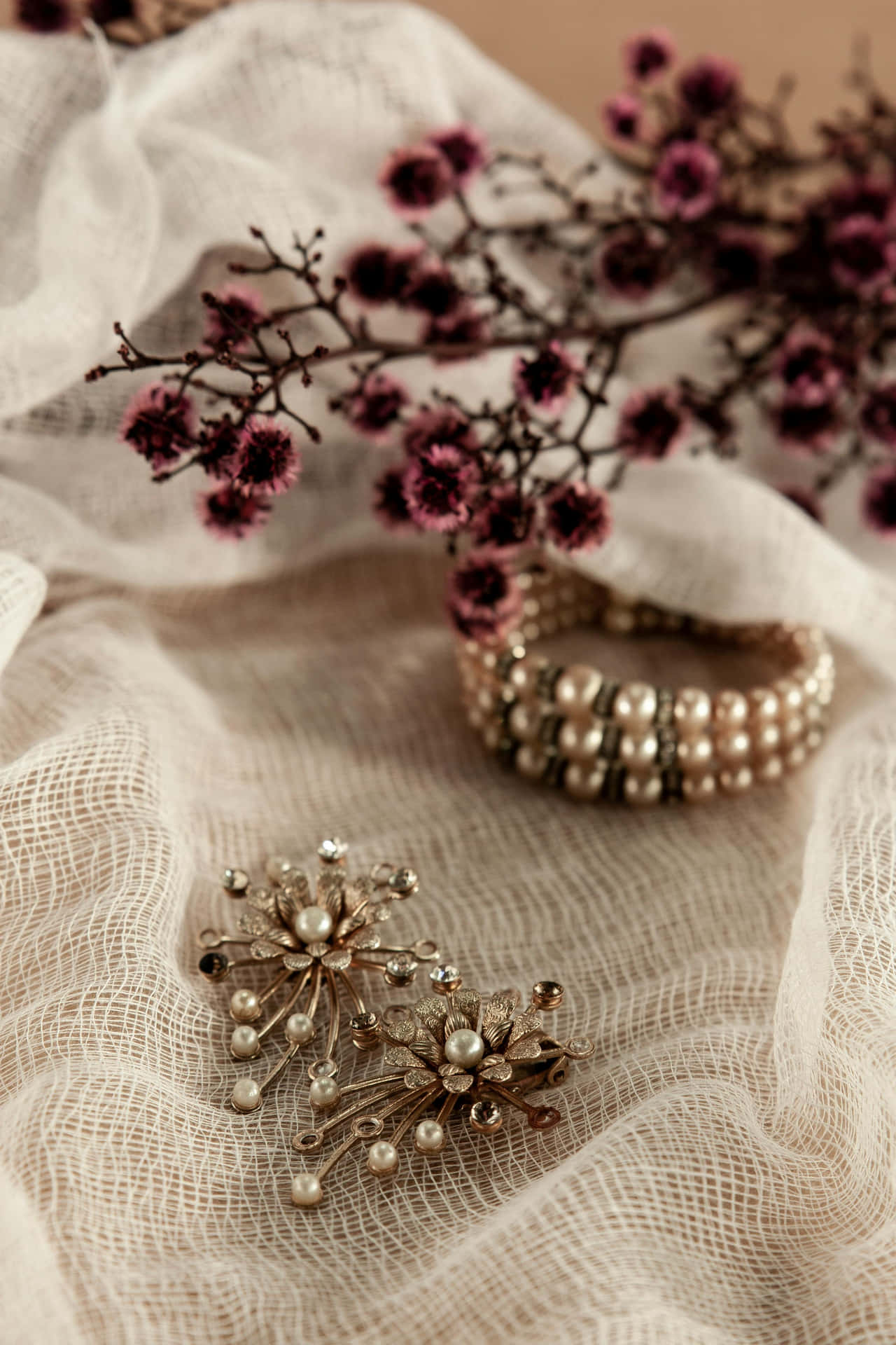 Elegant Pearl Jewelryand Dried Flowers Wallpaper