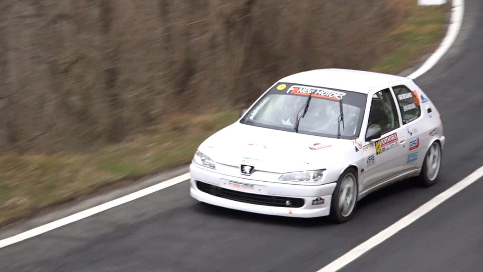 Elegant Peugeot 306 In Brilliant Red Wallpaper