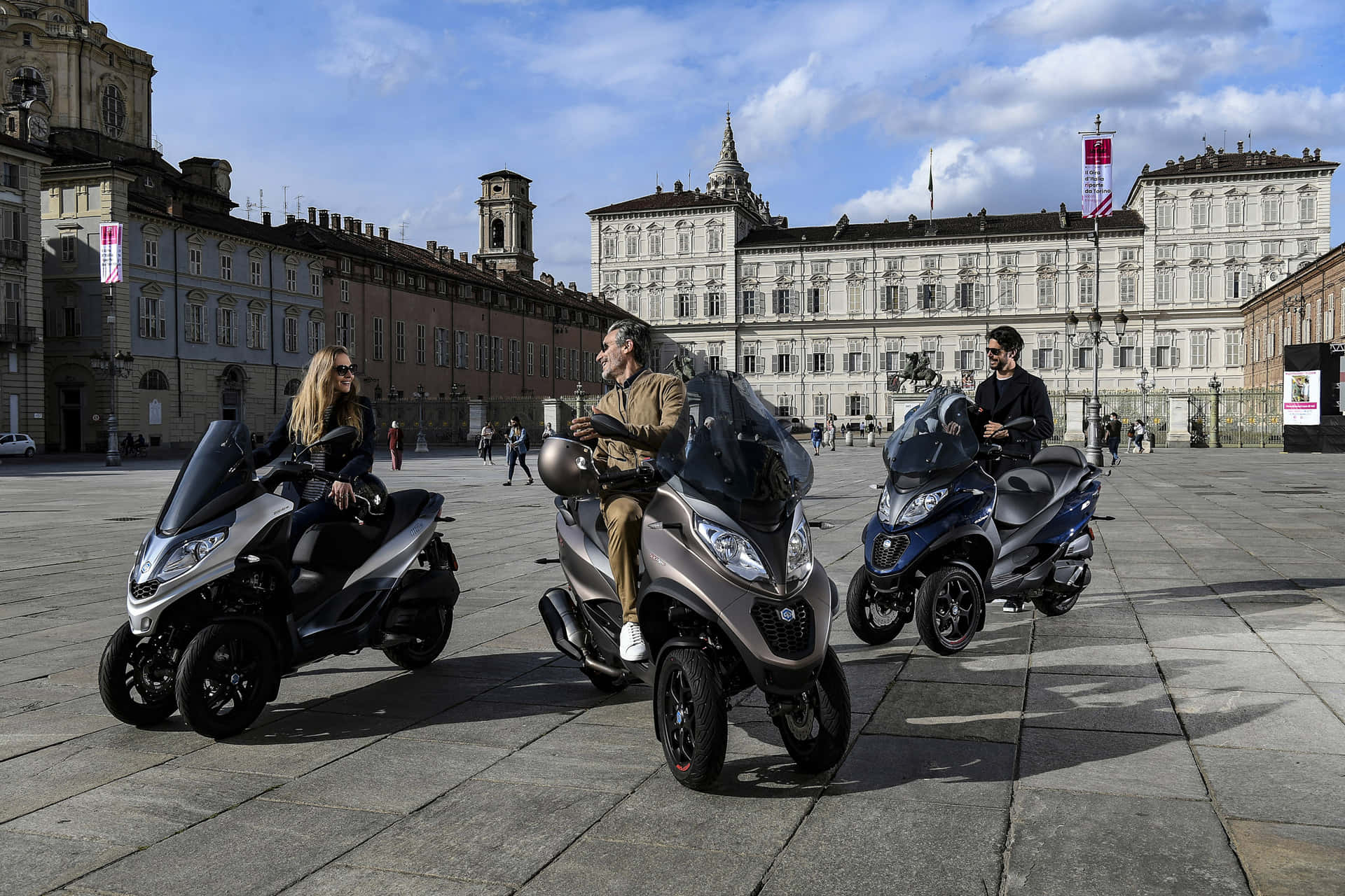 Elegant Piaggio Scooter In A Street Setting Wallpaper