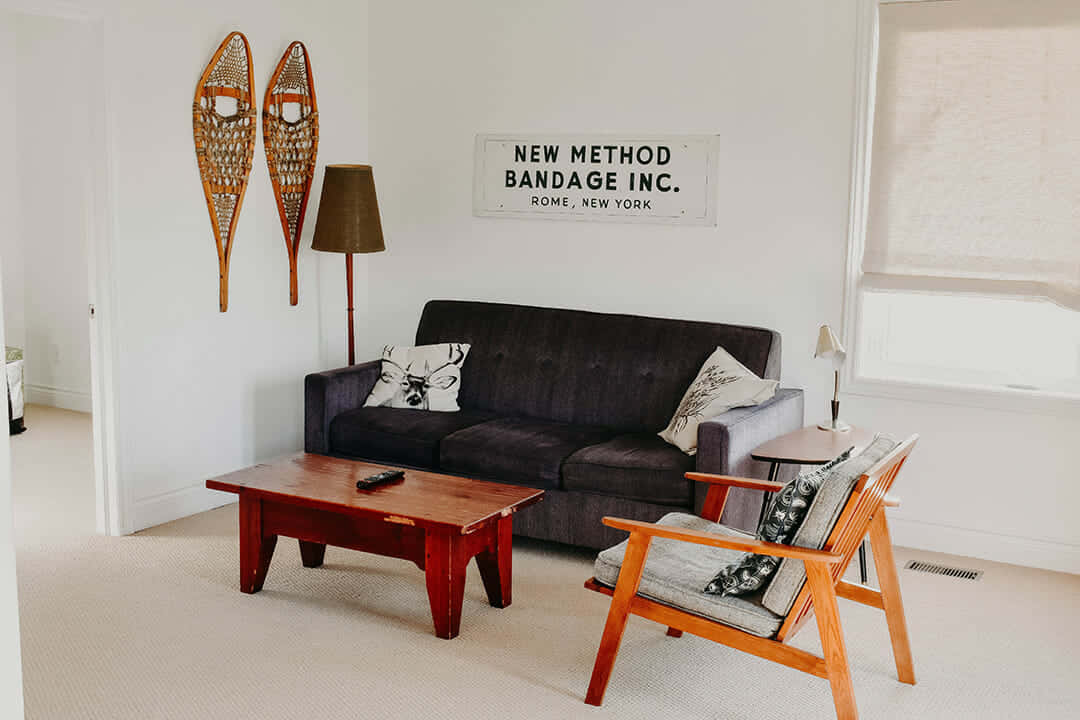 A Living Room With A Couch And A Coffee Table