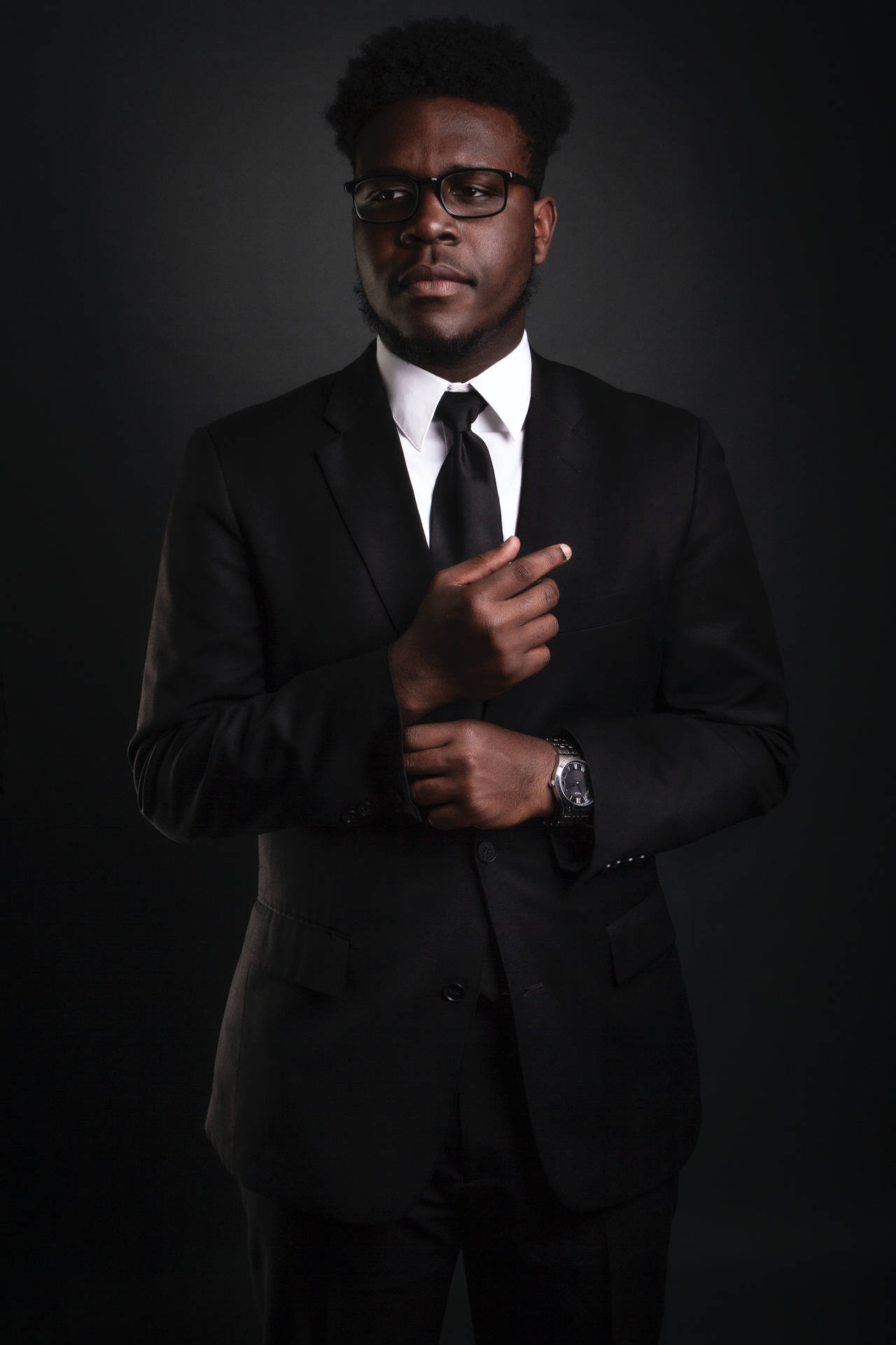 Elegant Shot Of A Black Man In Business Background
