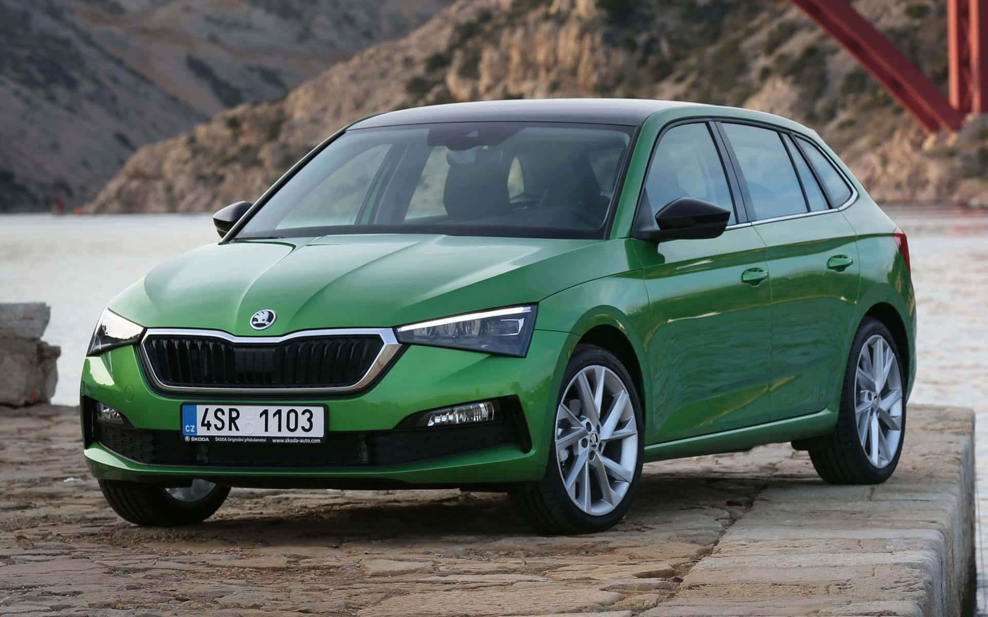 Elegant Skoda Scala In Vibrant Red Wallpaper