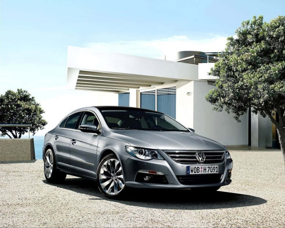 Volkswagen Passat Cc Elegan Meluncur Di Jalan Raya Wallpaper