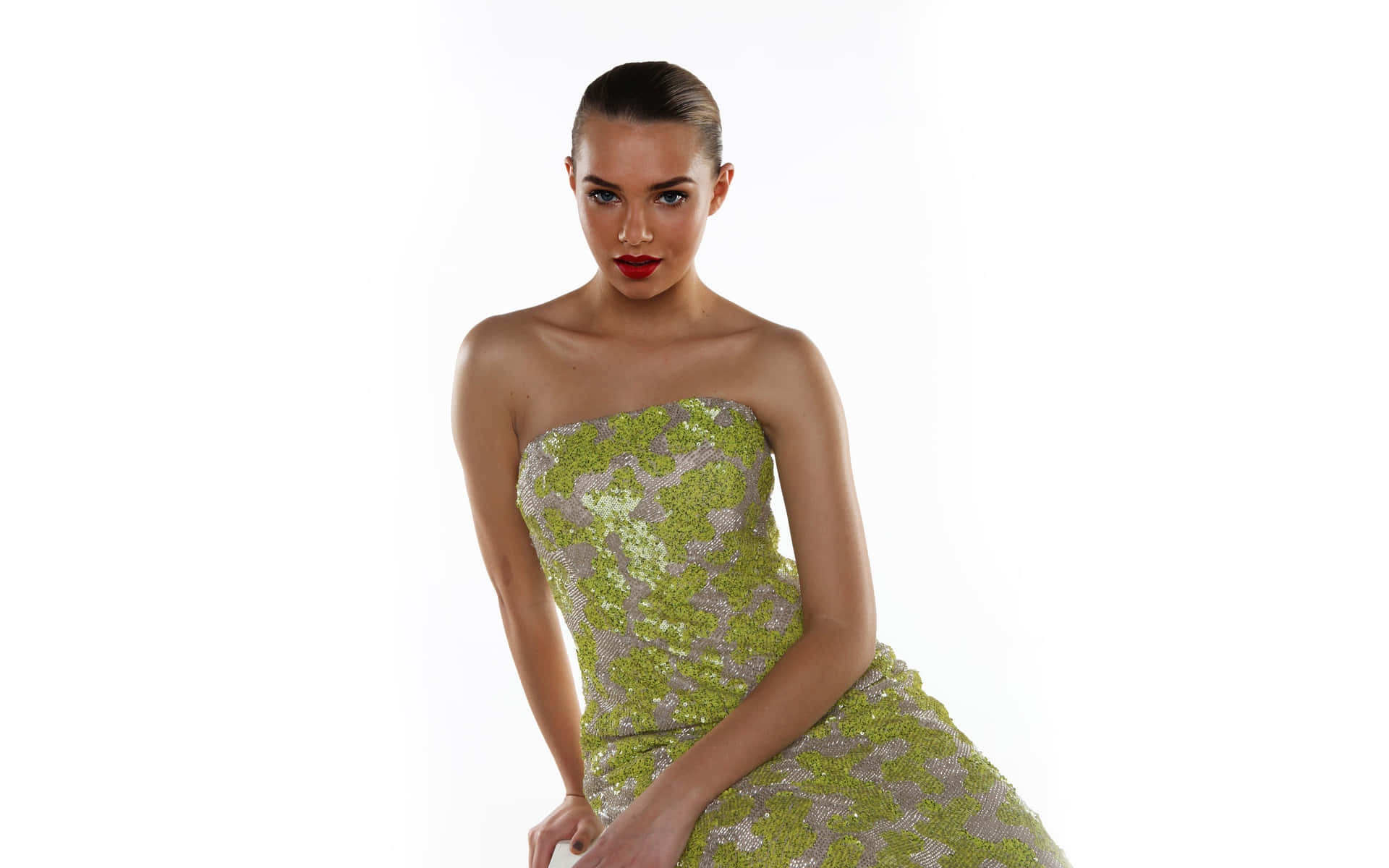 Elegant Womanin Green Sequined Dress Wallpaper
