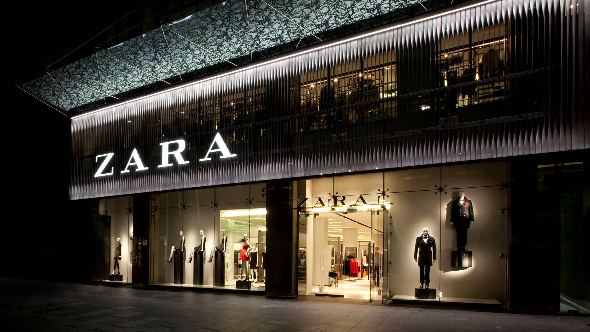 Elegant Zara Store At Night Wallpaper