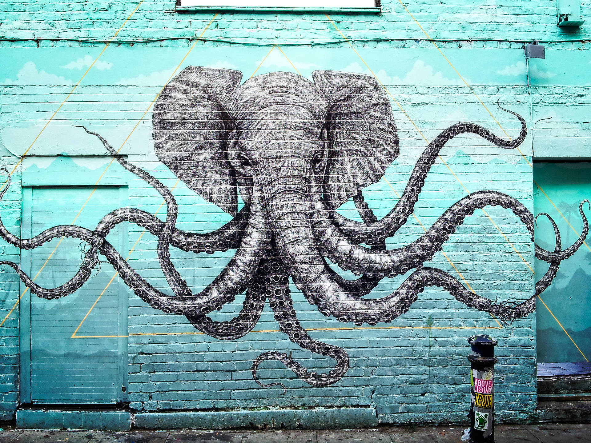 Colorful graffiti painting of an elephant and an octopus Wallpaper
