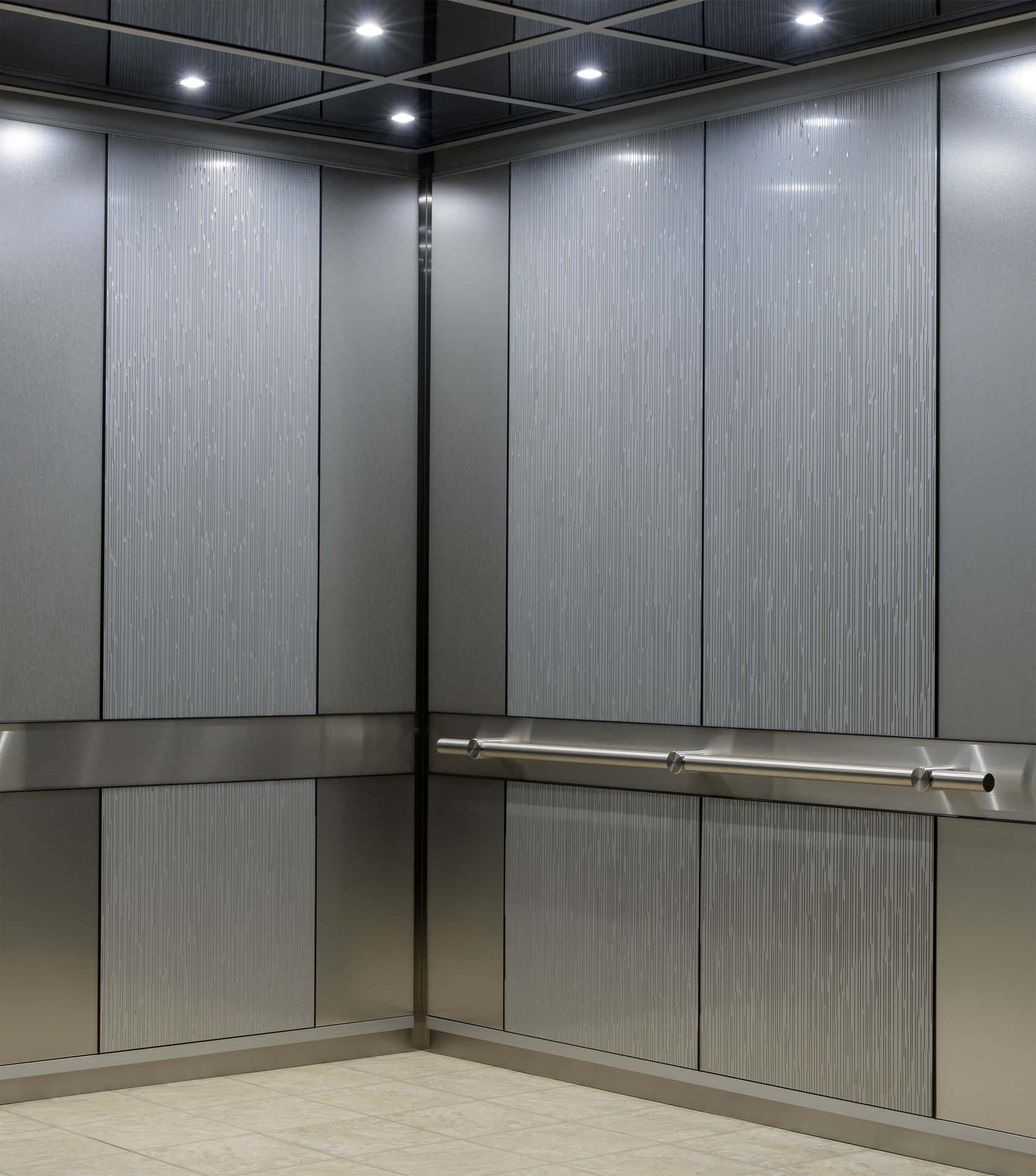 A Modern Elevator With A Silver Door