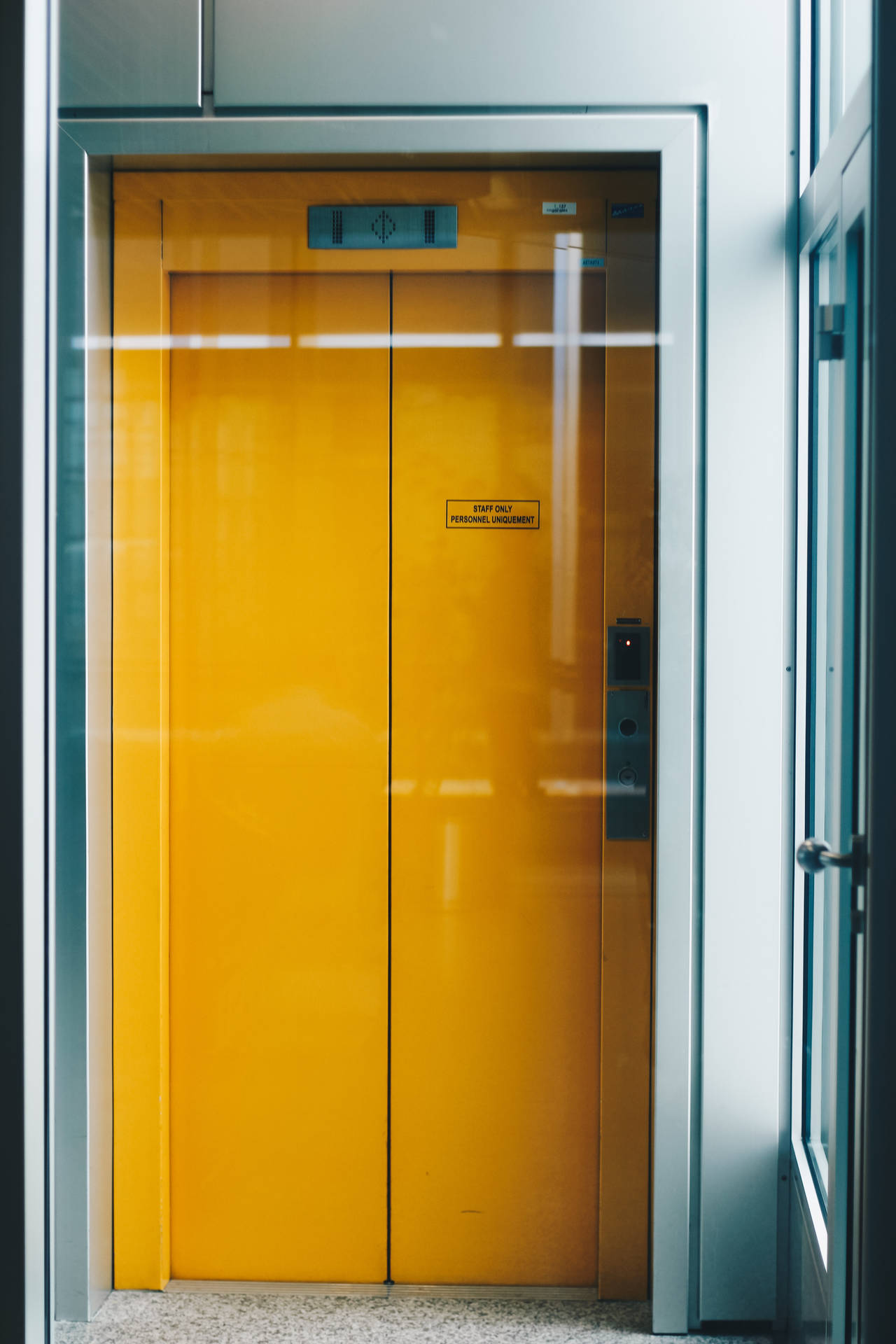 Elevator Yellow Hd Iphone Wallpaper