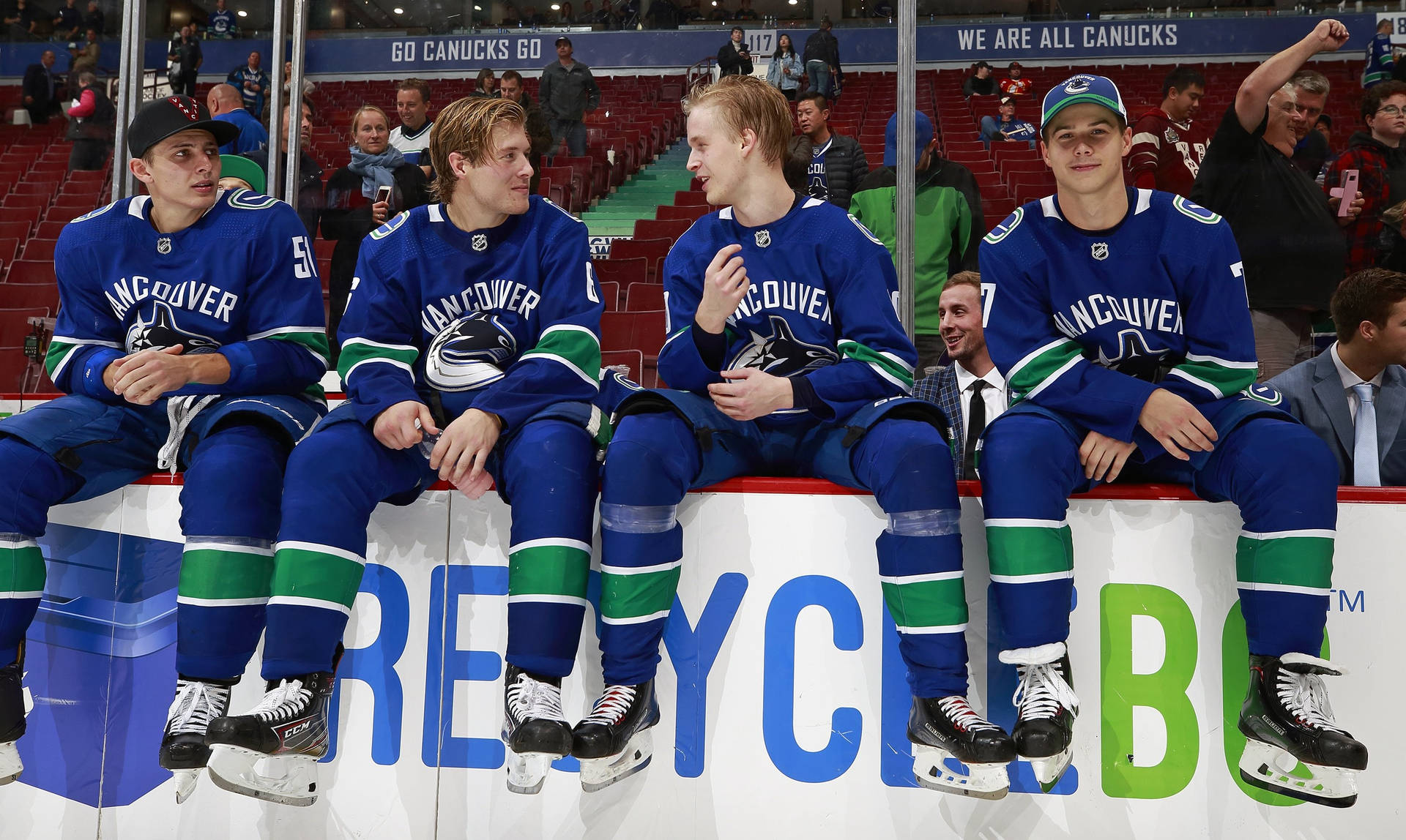 Elias Pettersson With Canucks Teammates Wallpaper