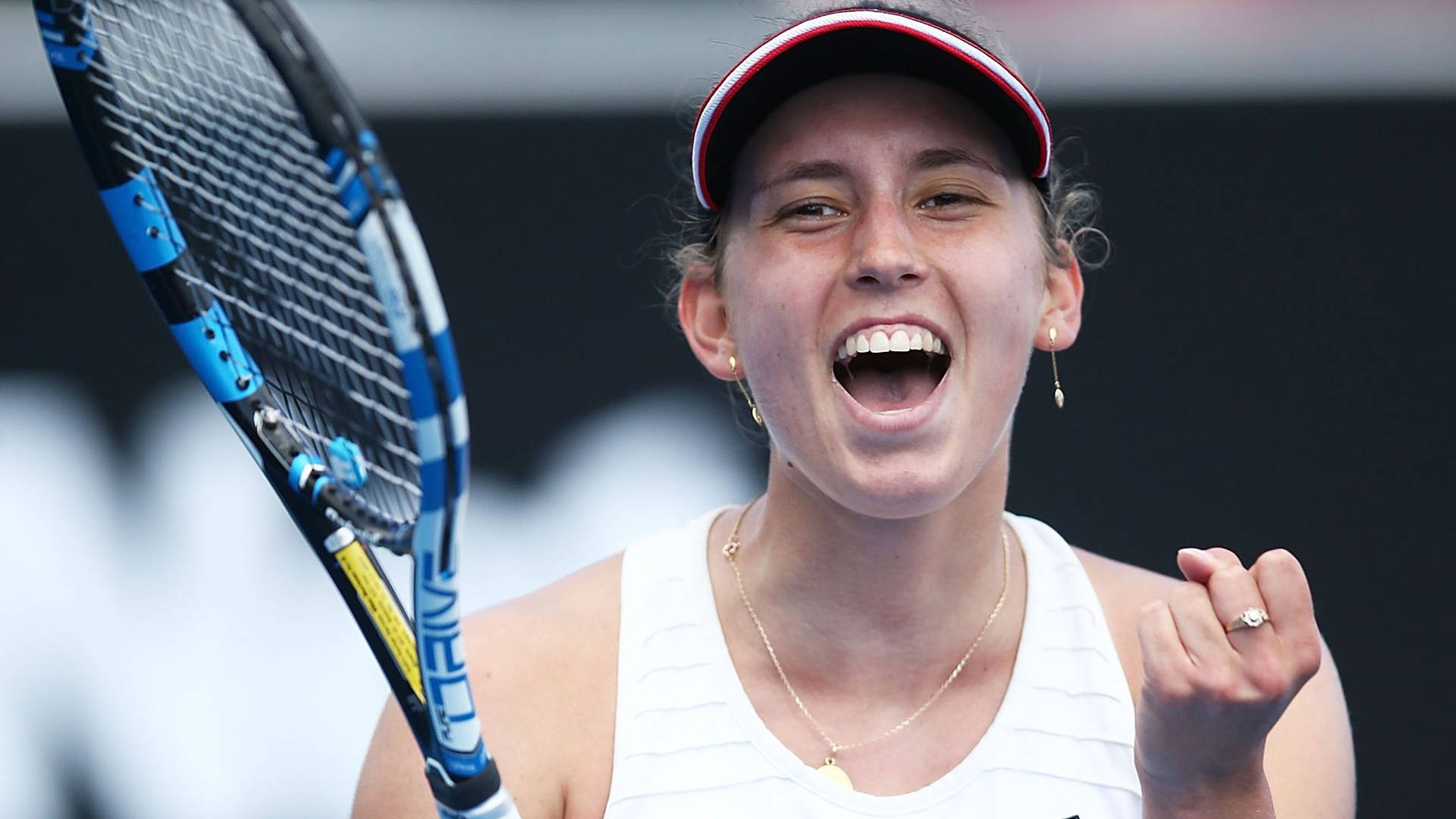 Elise Mertens Expresses Exhilaration After Winning a Tennis Match Wallpaper