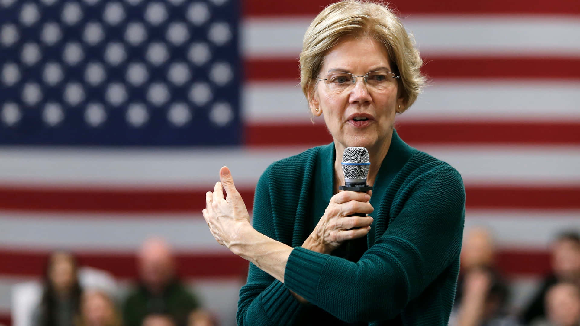 Elizabeth Warren Talking In Green Sweater Wallpaper